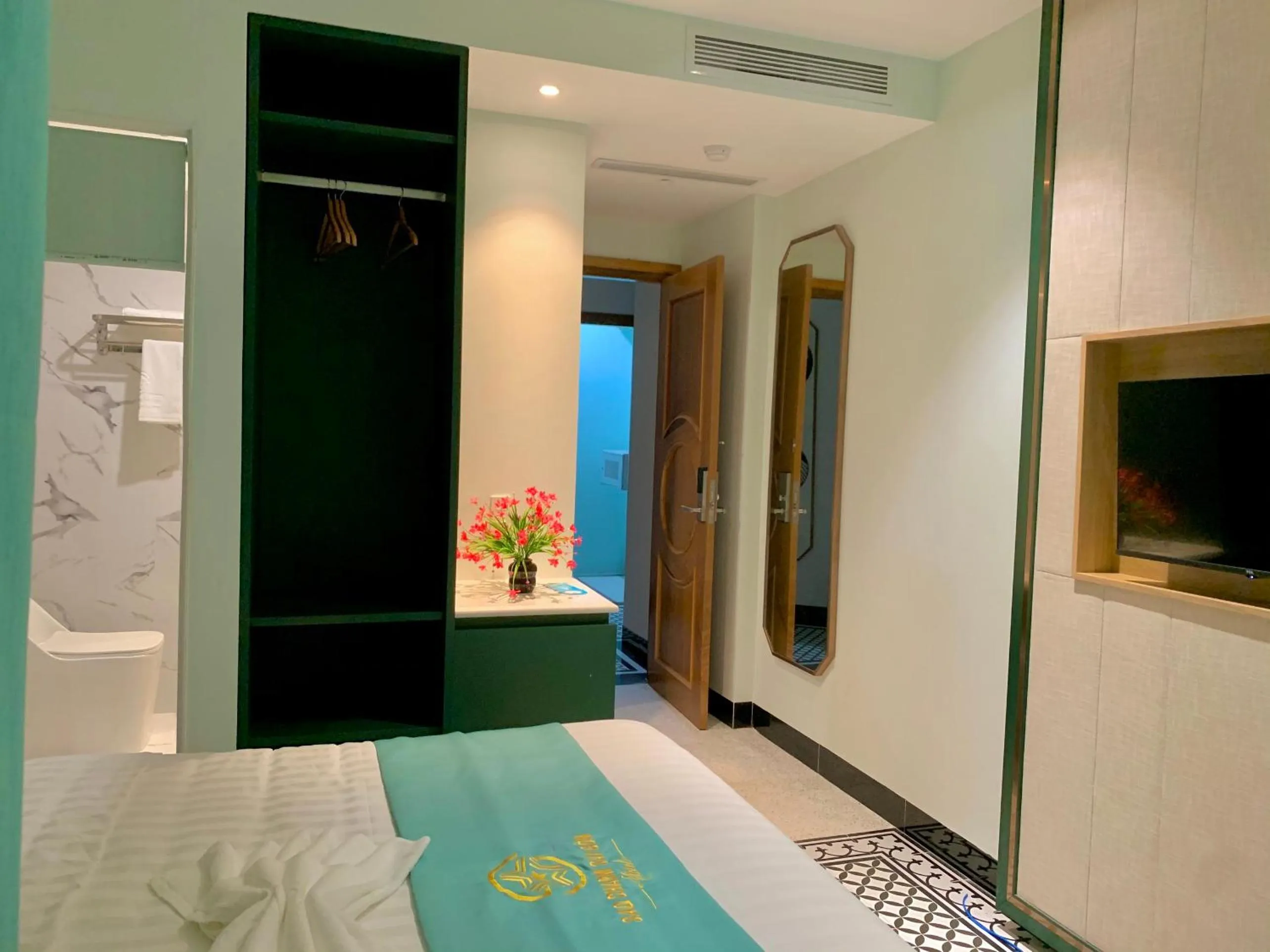 Bed in Sao Charm Sài Gòn Hotel