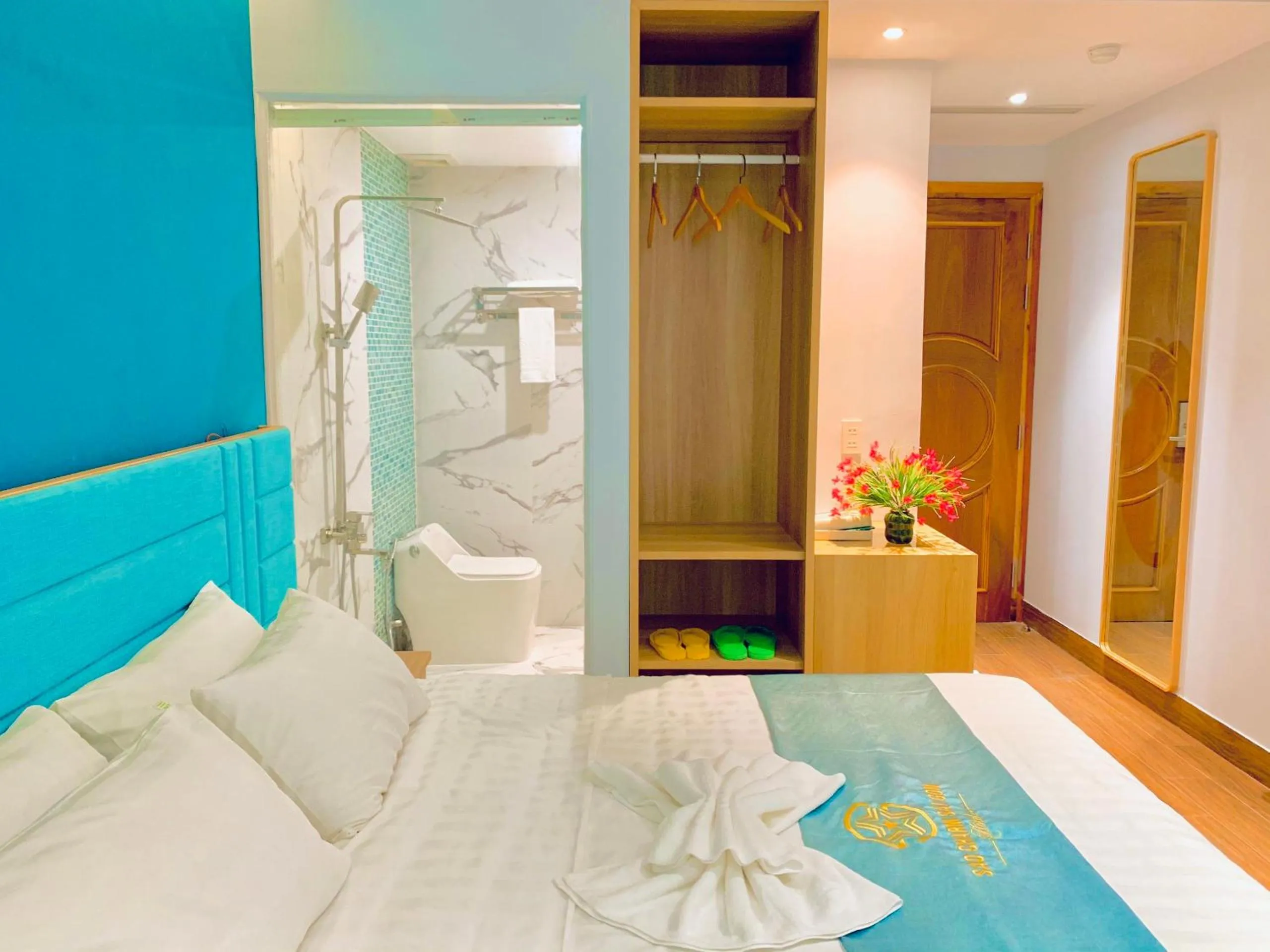 Bed in Sao Charm Sài Gòn Hotel