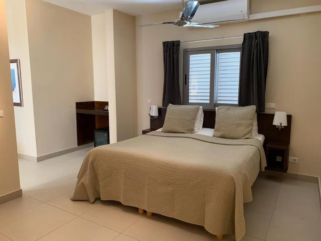 Photo of the whole room, Bed in Thebonairian