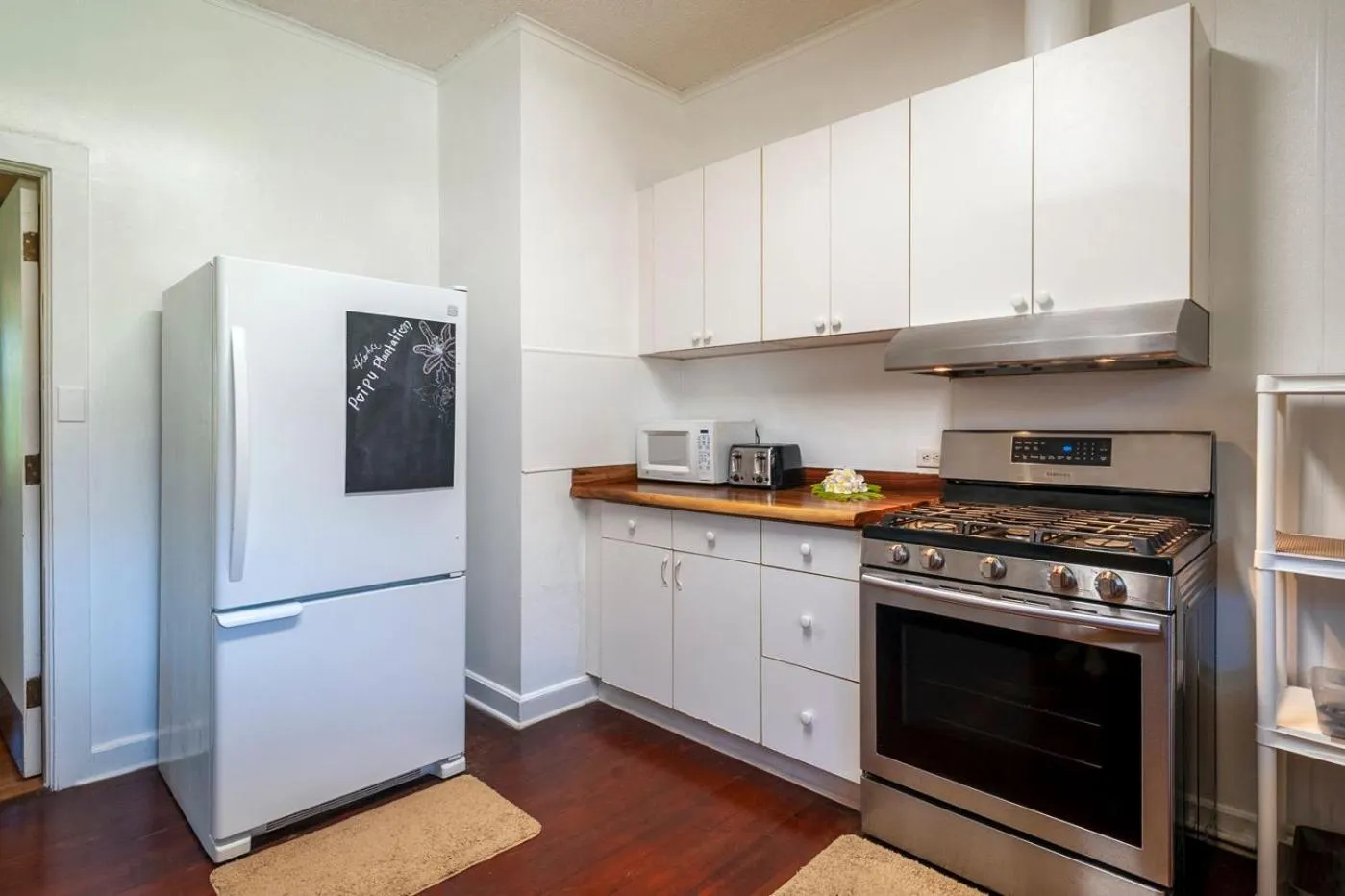 Kitchen or kitchenette in Poipu Plantation Vacation Rentals