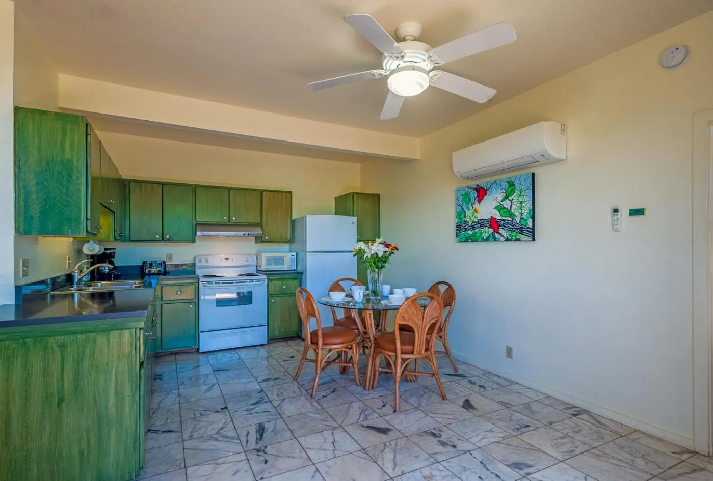 Kitchen or kitchenette in Poipu Plantation Vacation Rentals
