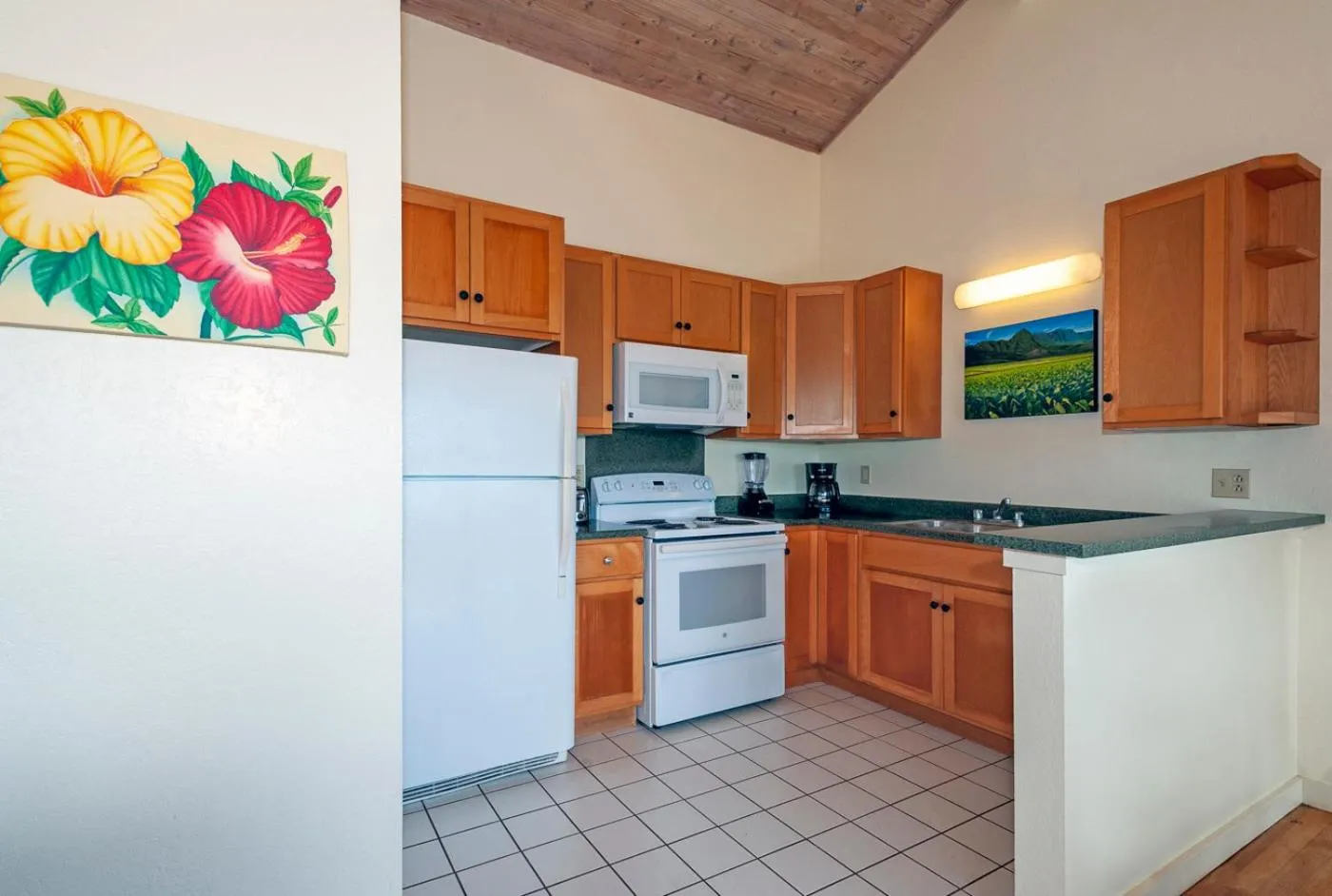 Kitchen or kitchenette in Poipu Plantation Vacation Rentals