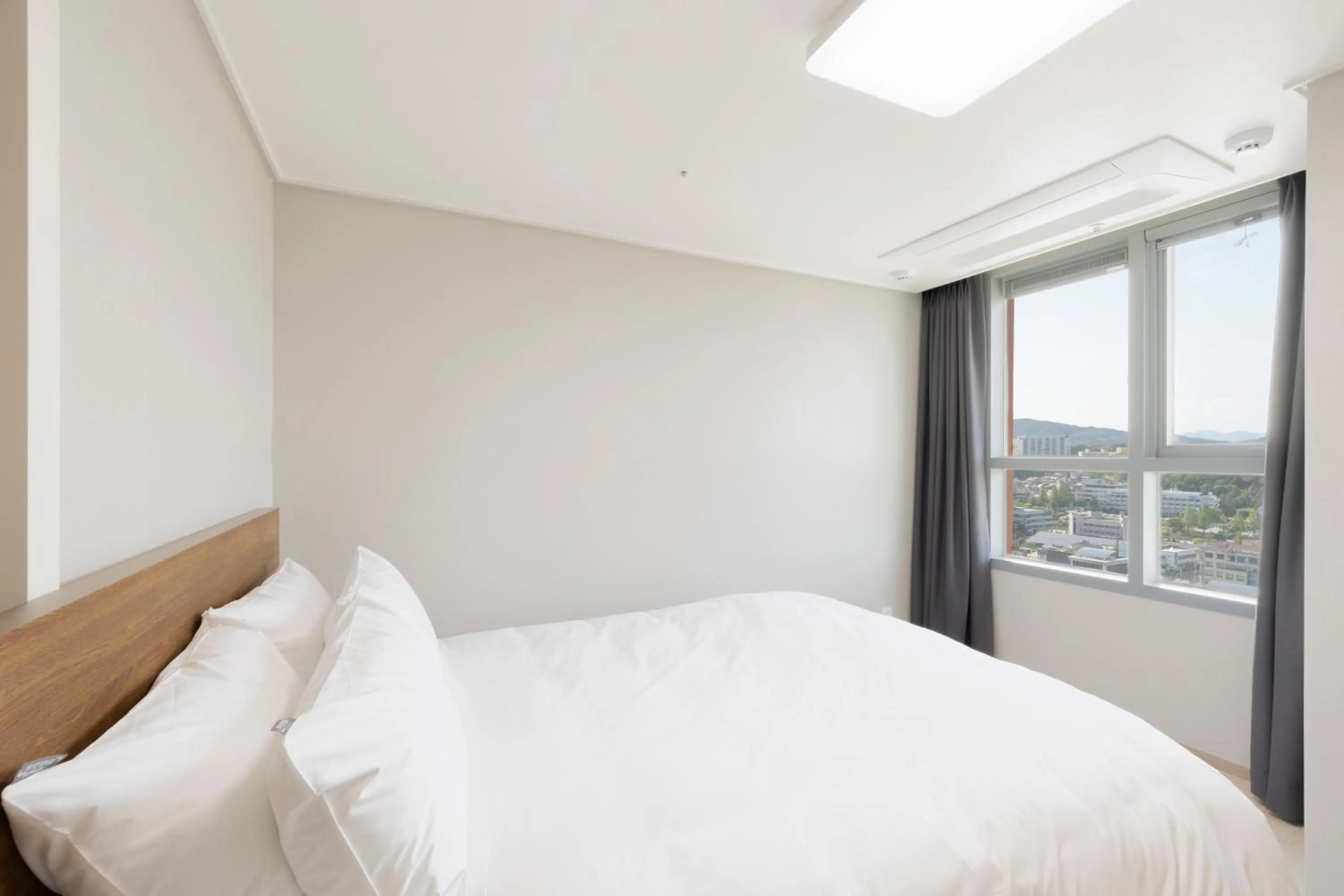 Bed in Donghae Oceancity Residence Hotel