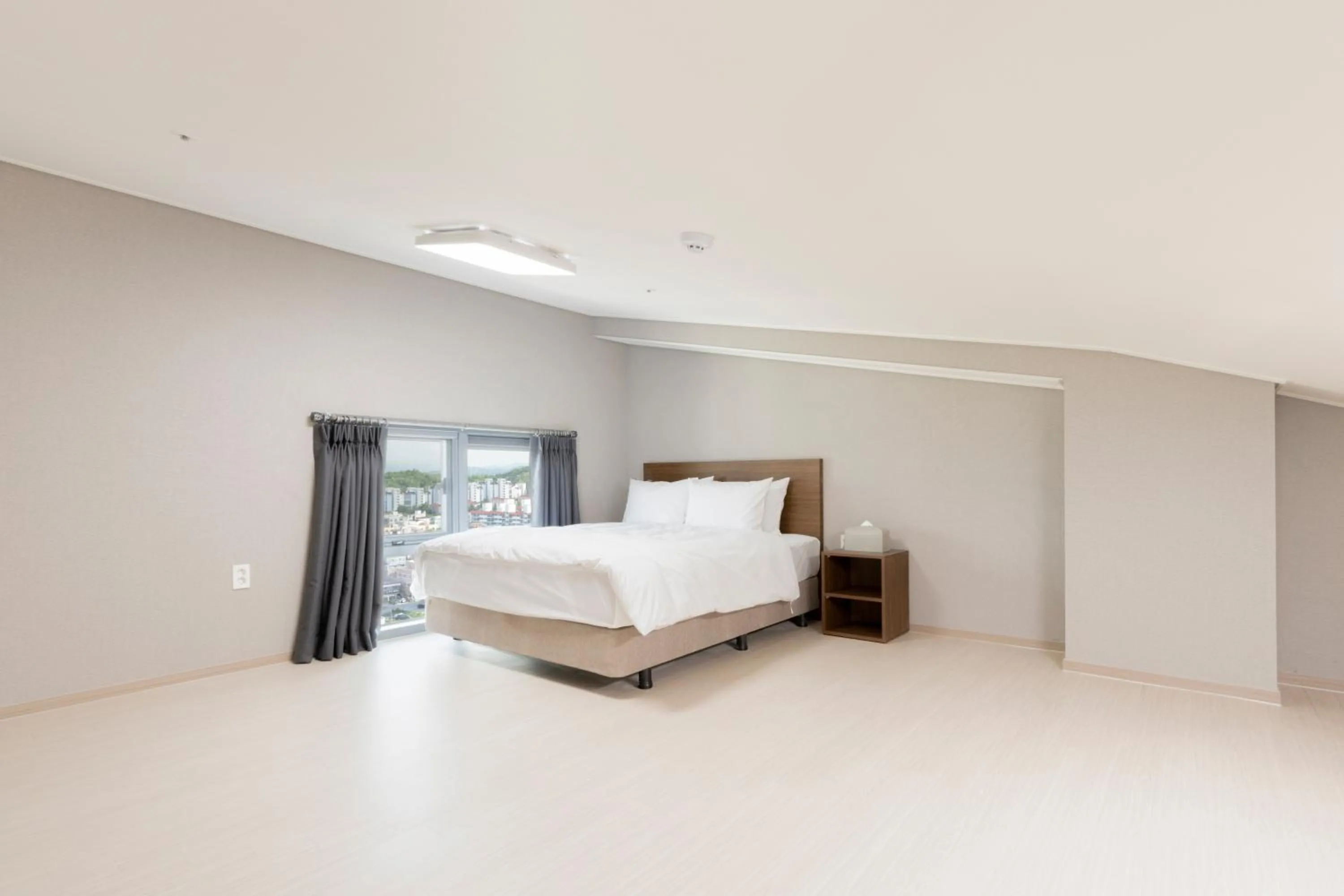 Bed in Donghae Oceancity Residence Hotel