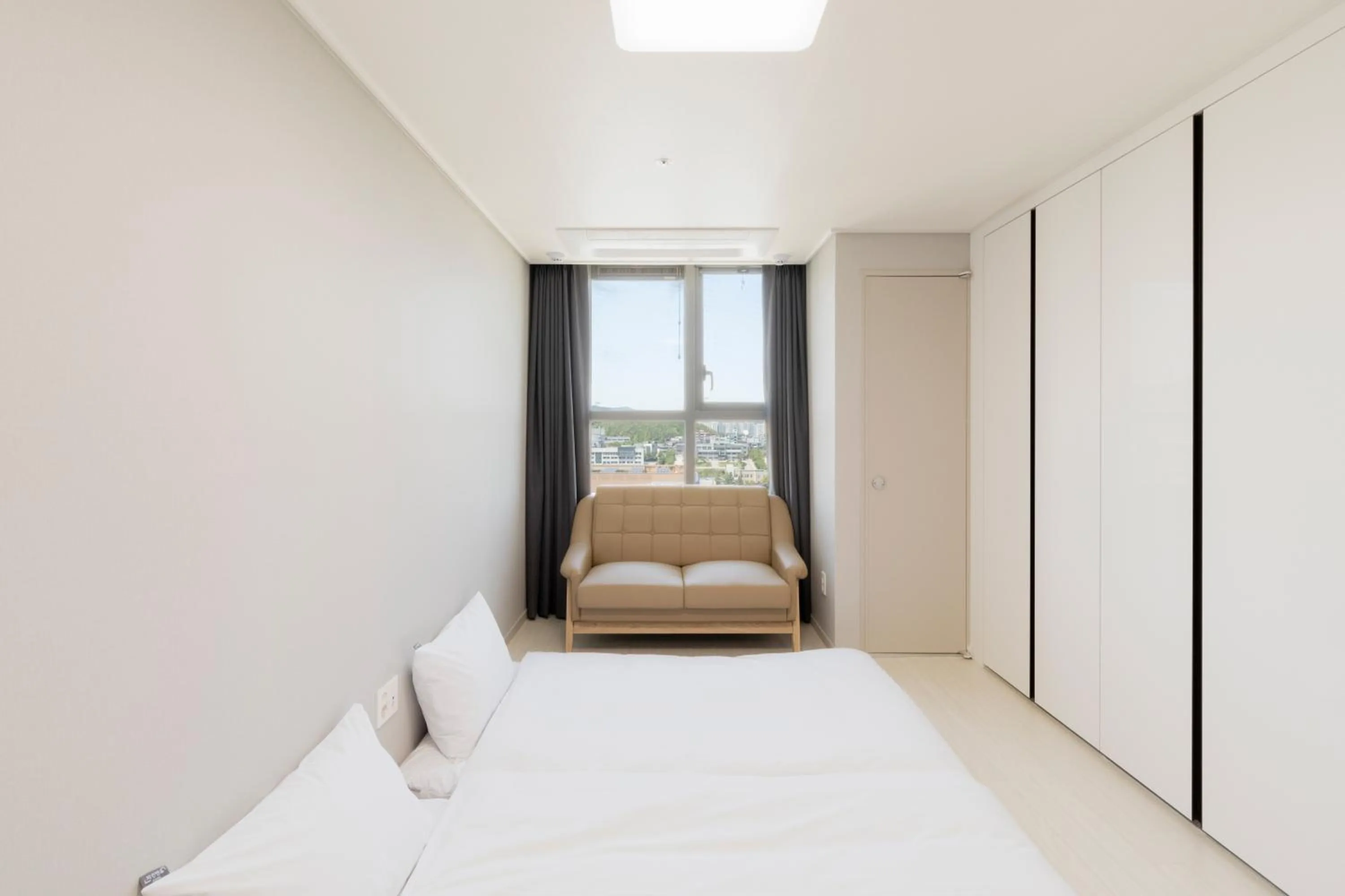 Bed in Donghae Oceancity Residence Hotel