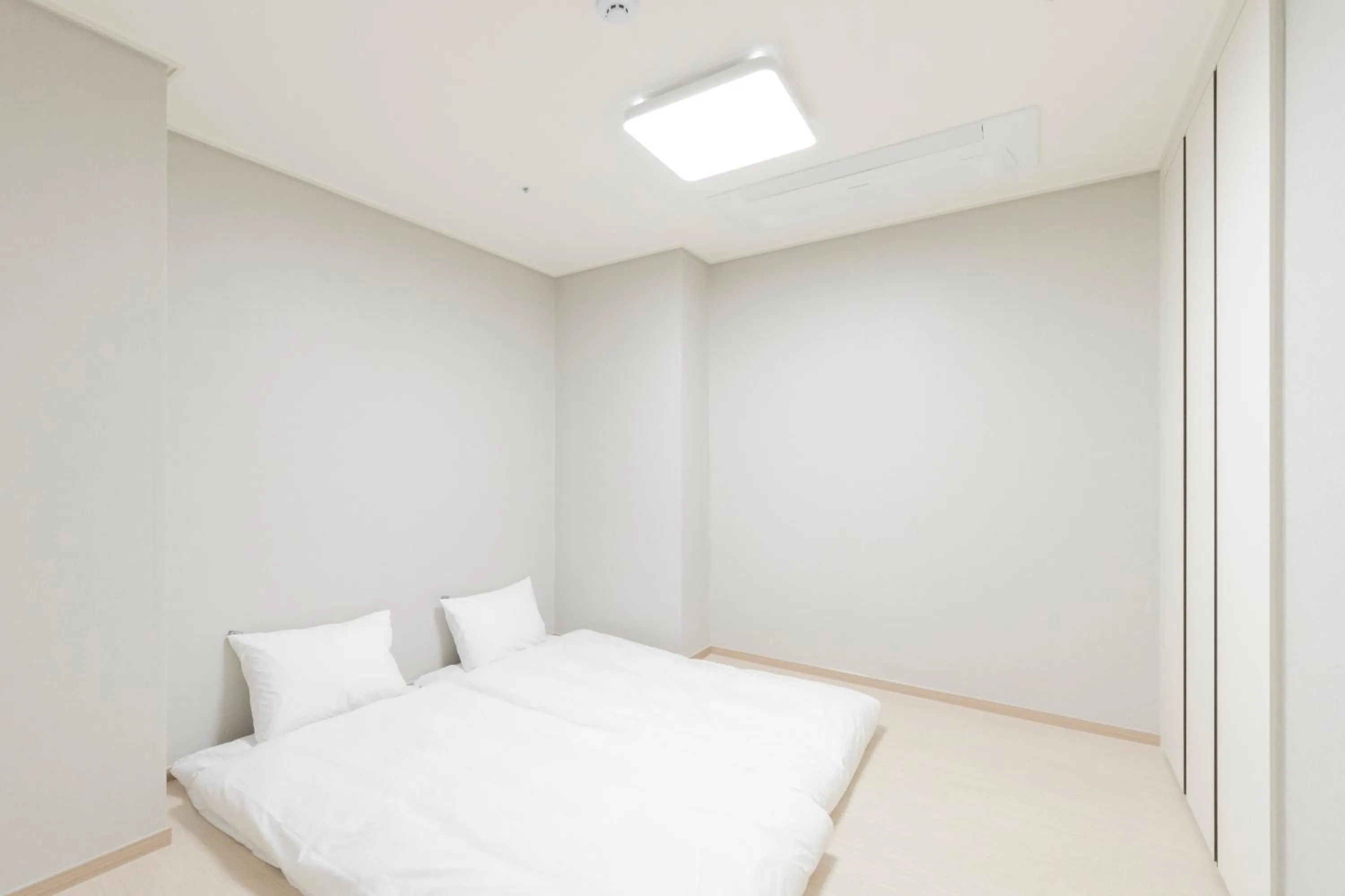 Bed in Donghae Oceancity Residence Hotel