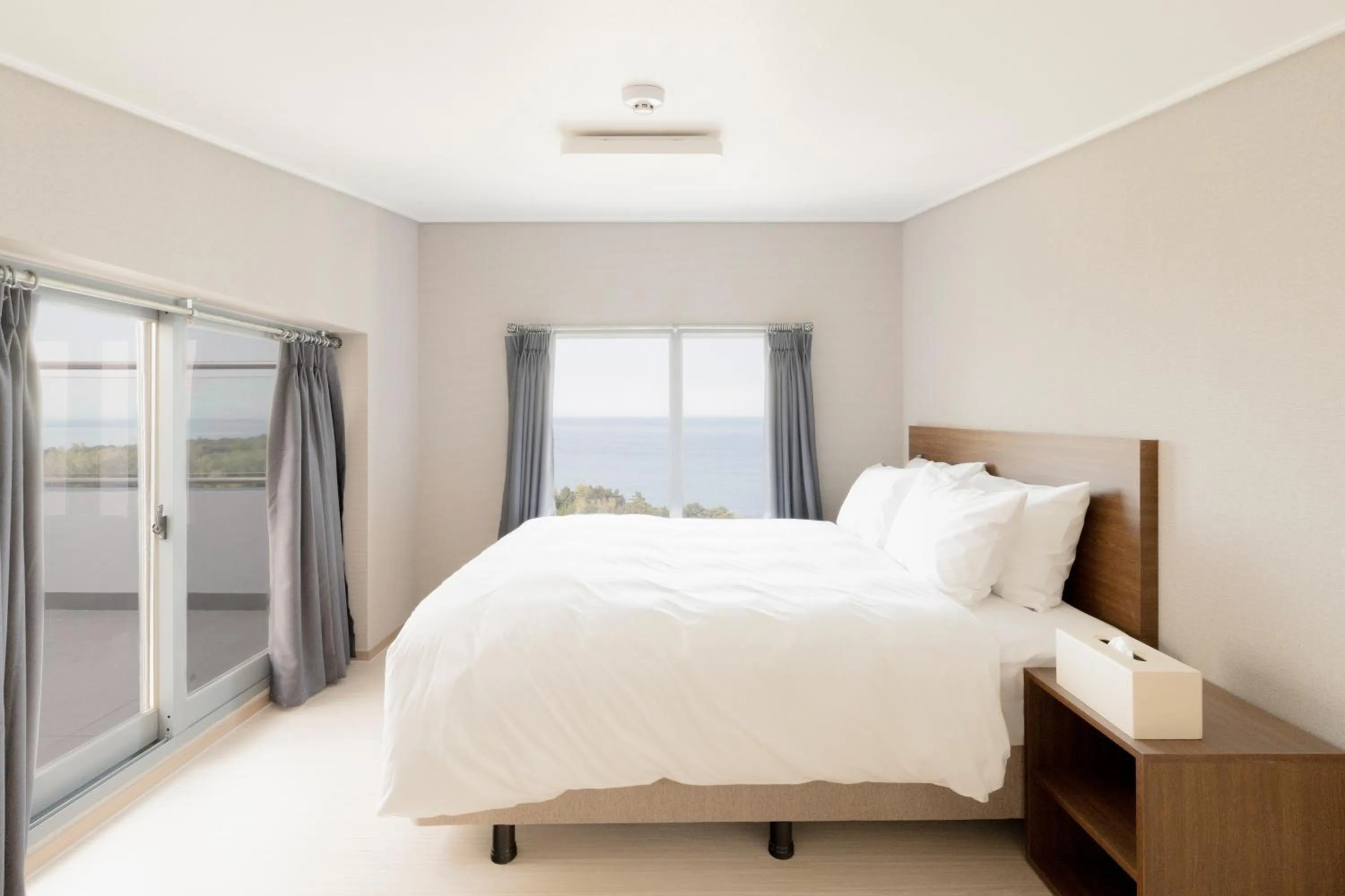 Bed in Donghae Oceancity Residence Hotel