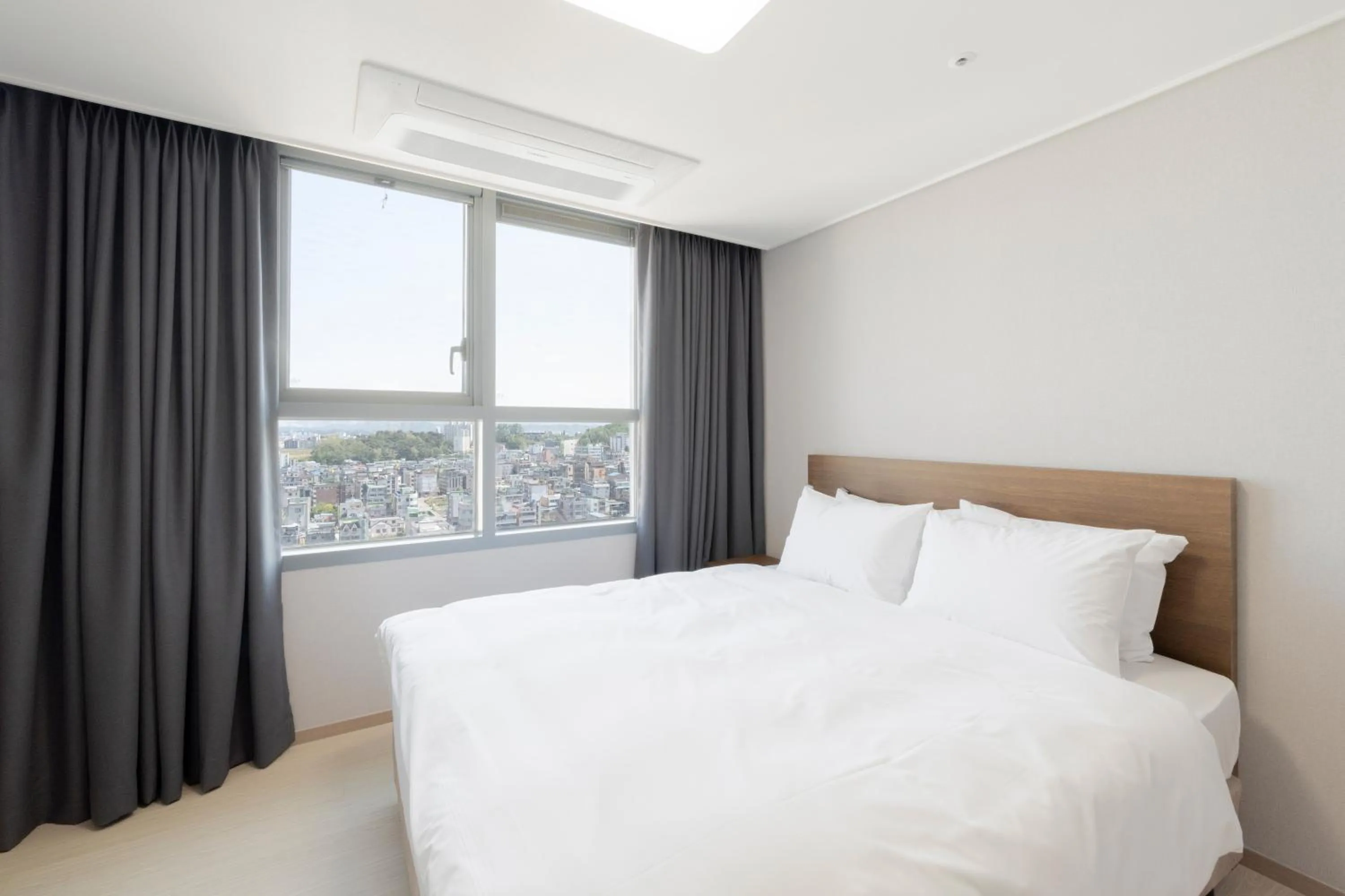 Bed in Donghae Oceancity Residence Hotel