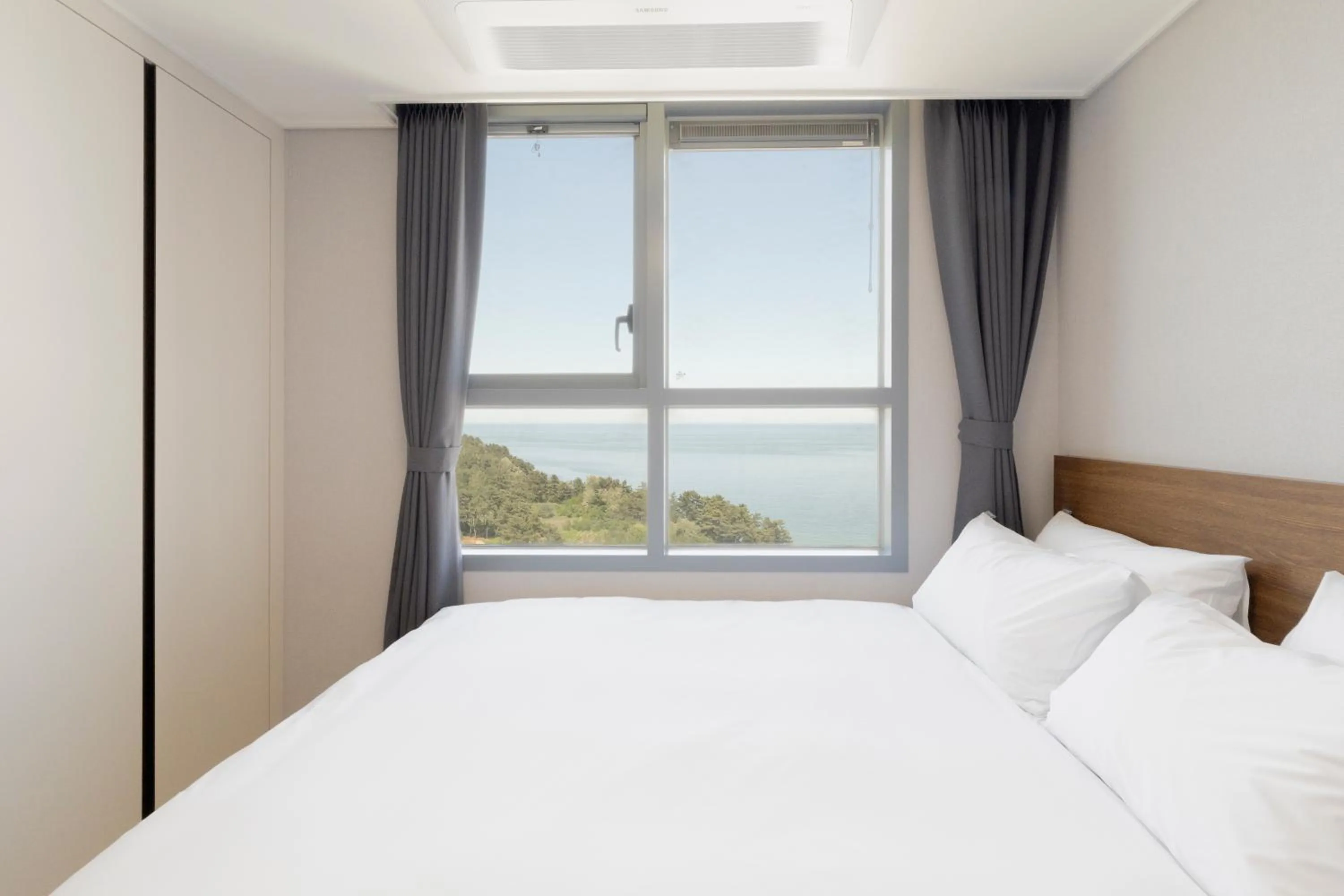 Bed in Donghae Oceancity Residence Hotel