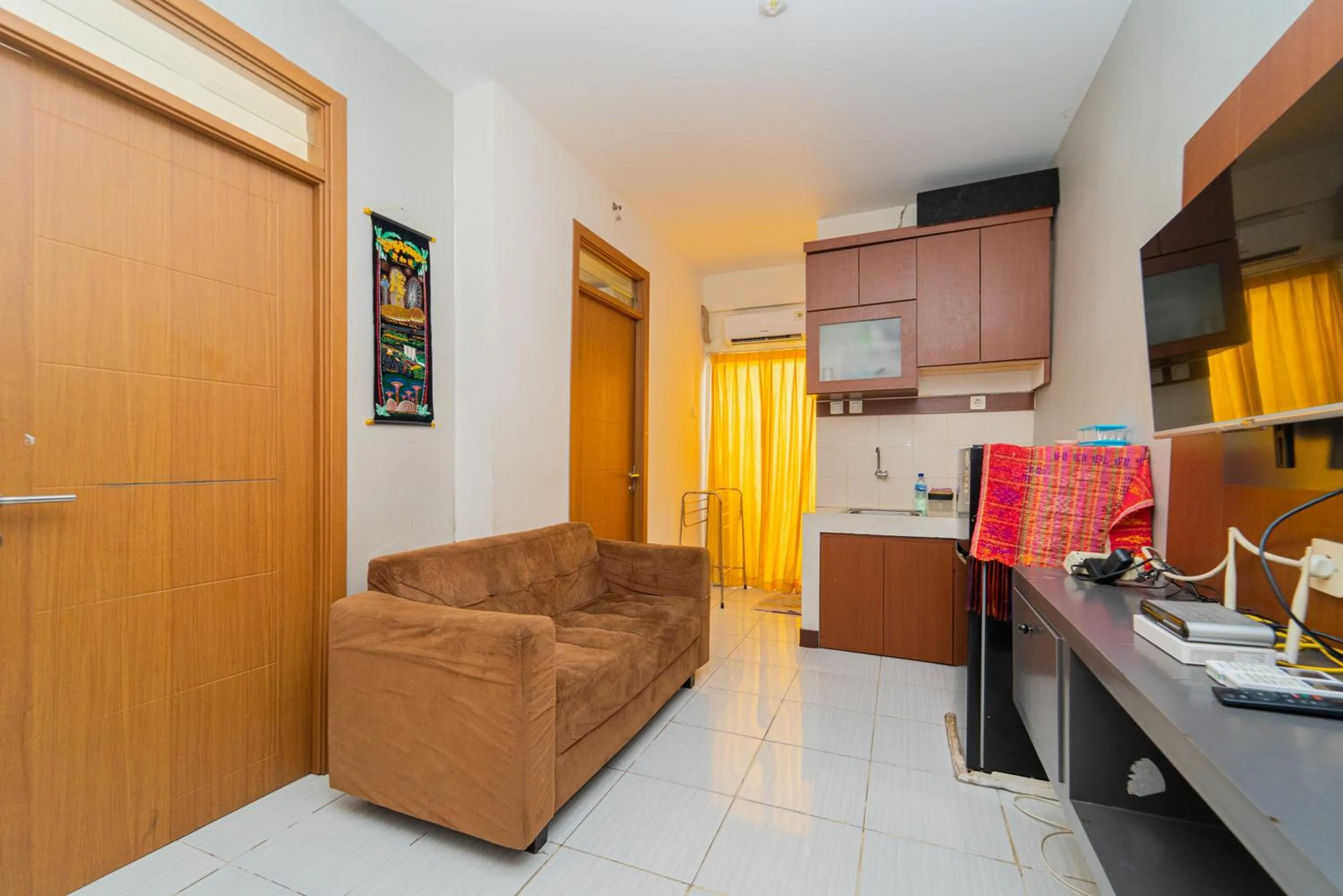 Living room in RedLiving Apartemen Cinere Resort - Gold Room