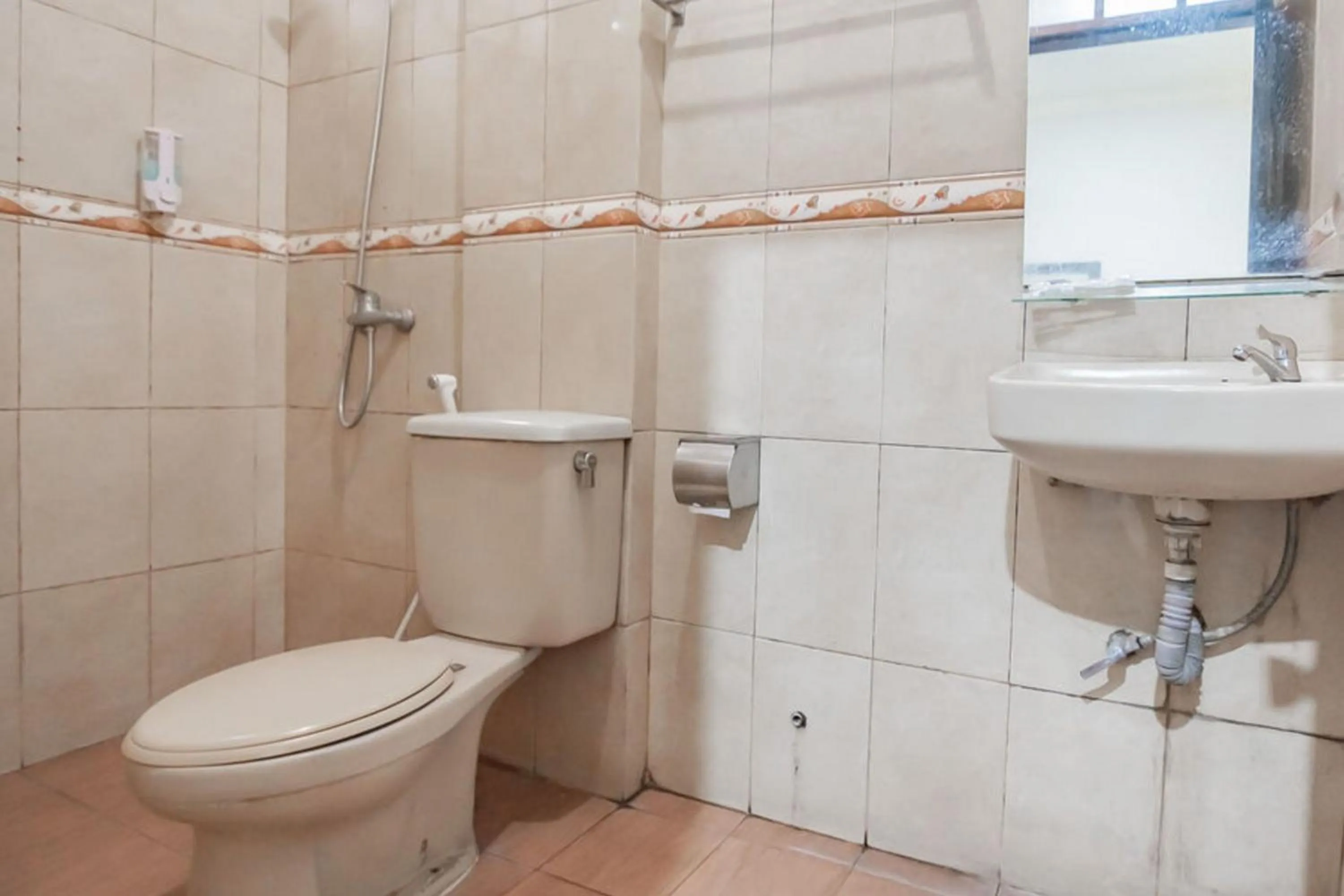 Bathroom in Sans Hotel Cihampelas Bandung