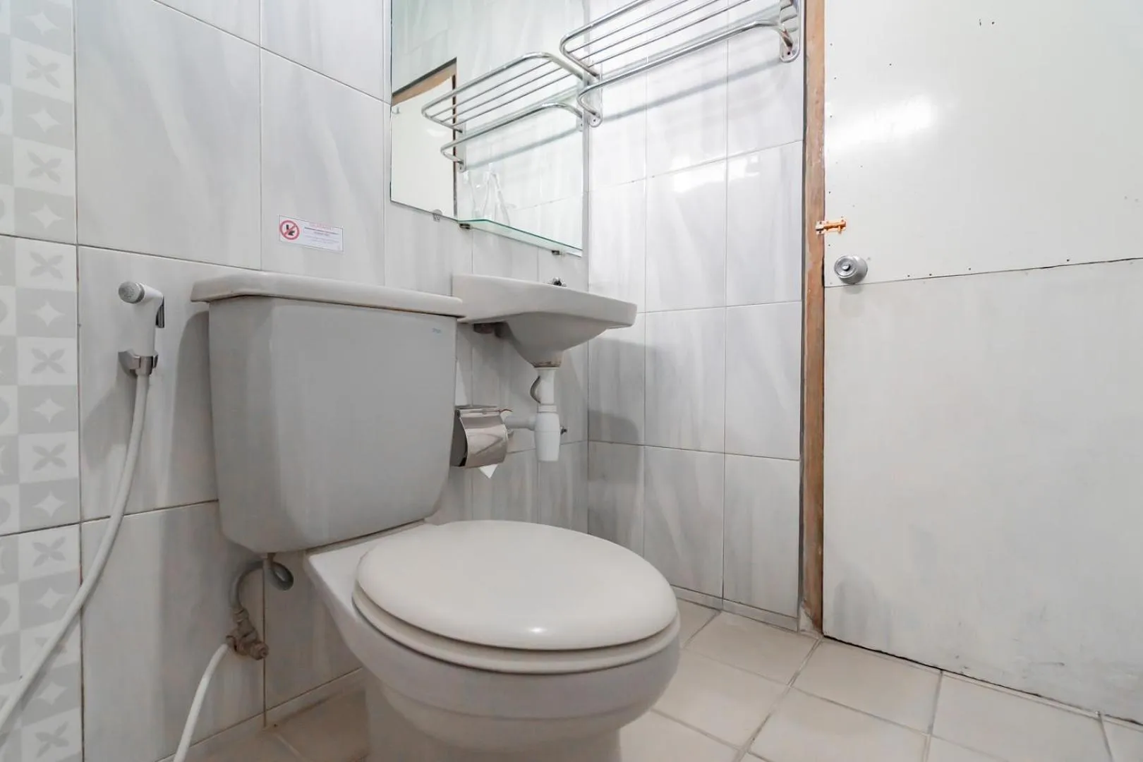 Bathroom in Sans Hotel Cihampelas Bandung