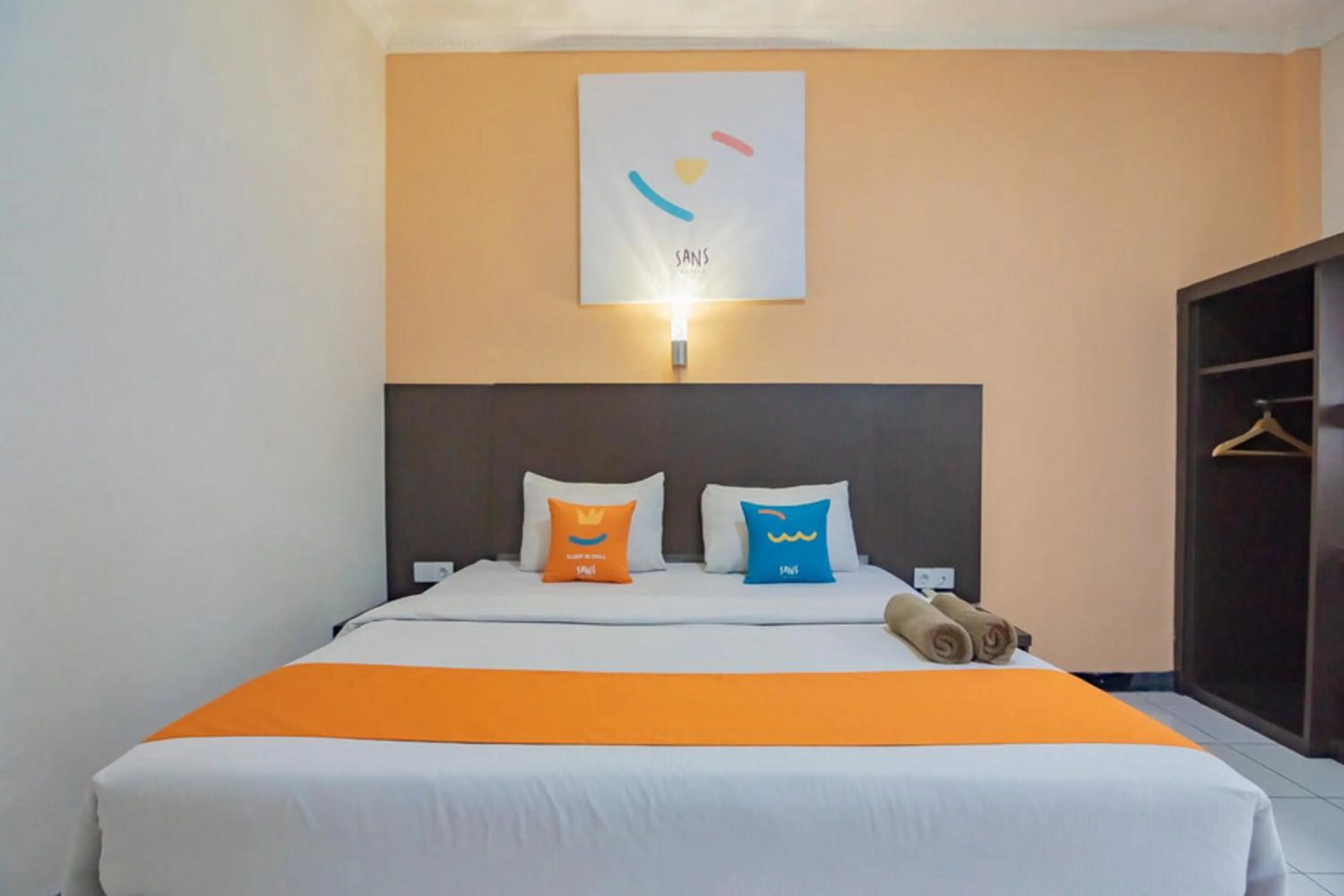 Bedroom in Sans Hotel Cihampelas Bandung