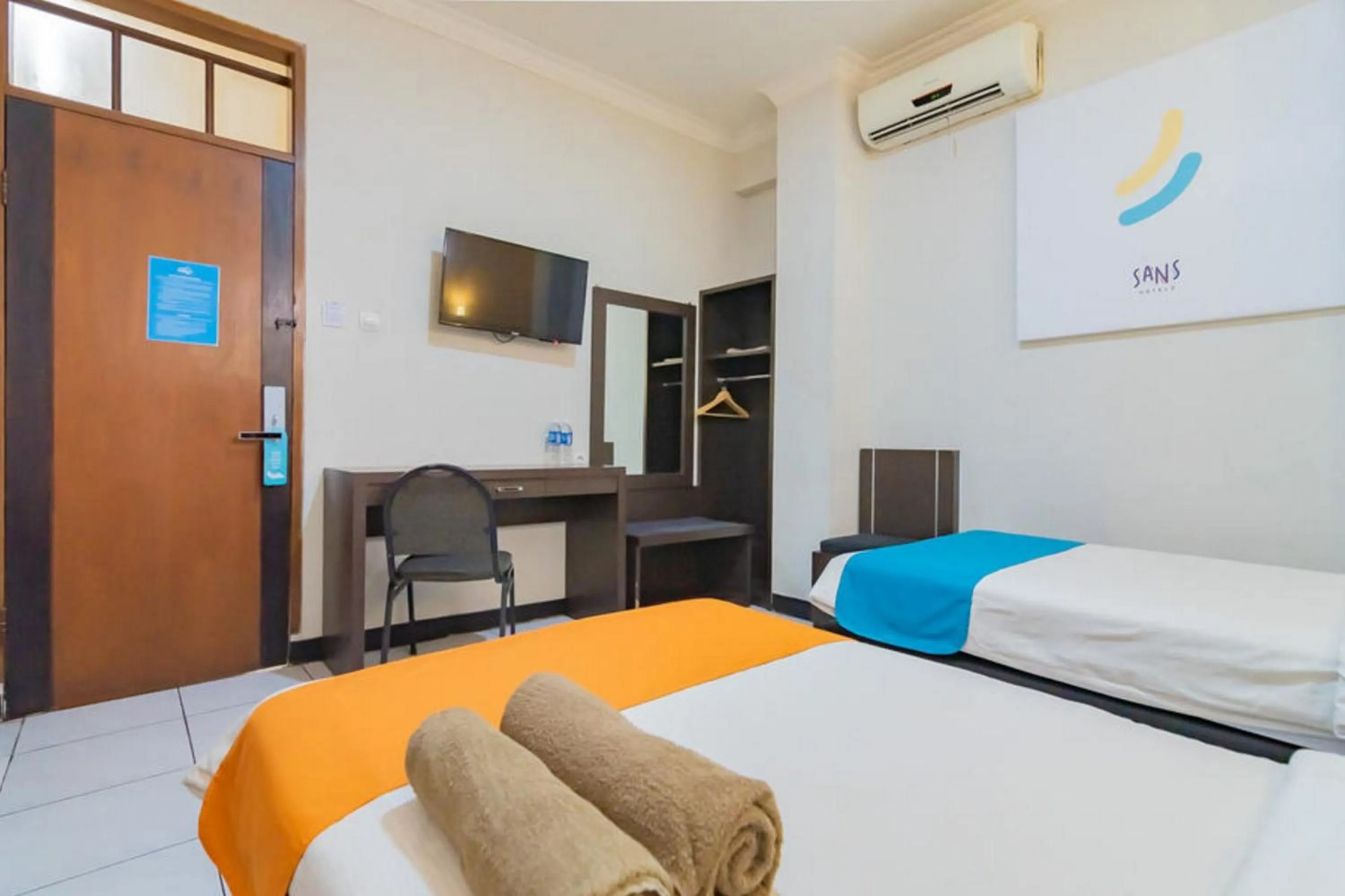 Bedroom in Sans Hotel Cihampelas Bandung