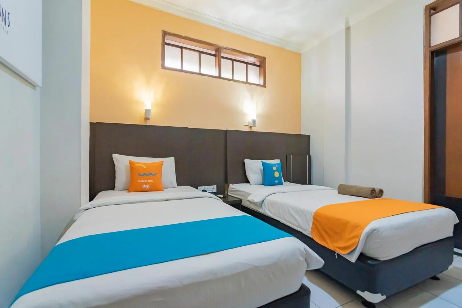 Bedroom in Sans Hotel Cihampelas Bandung