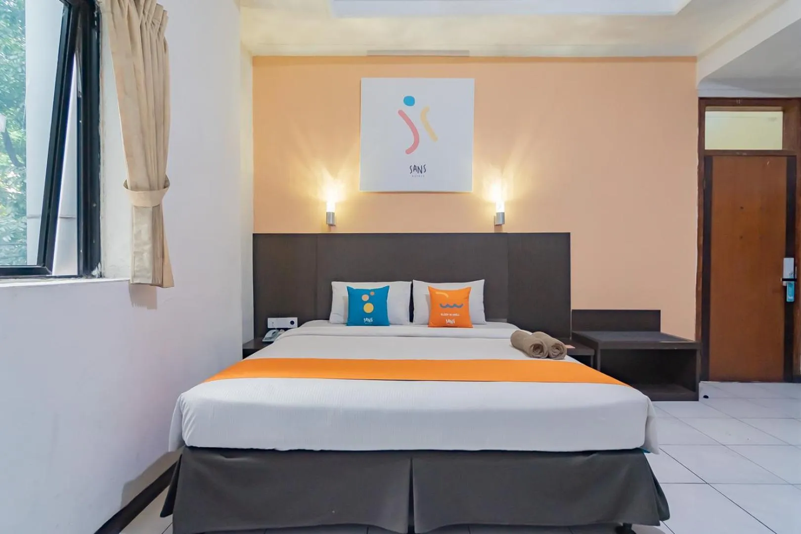 Bedroom in Sans Hotel Cihampelas Bandung