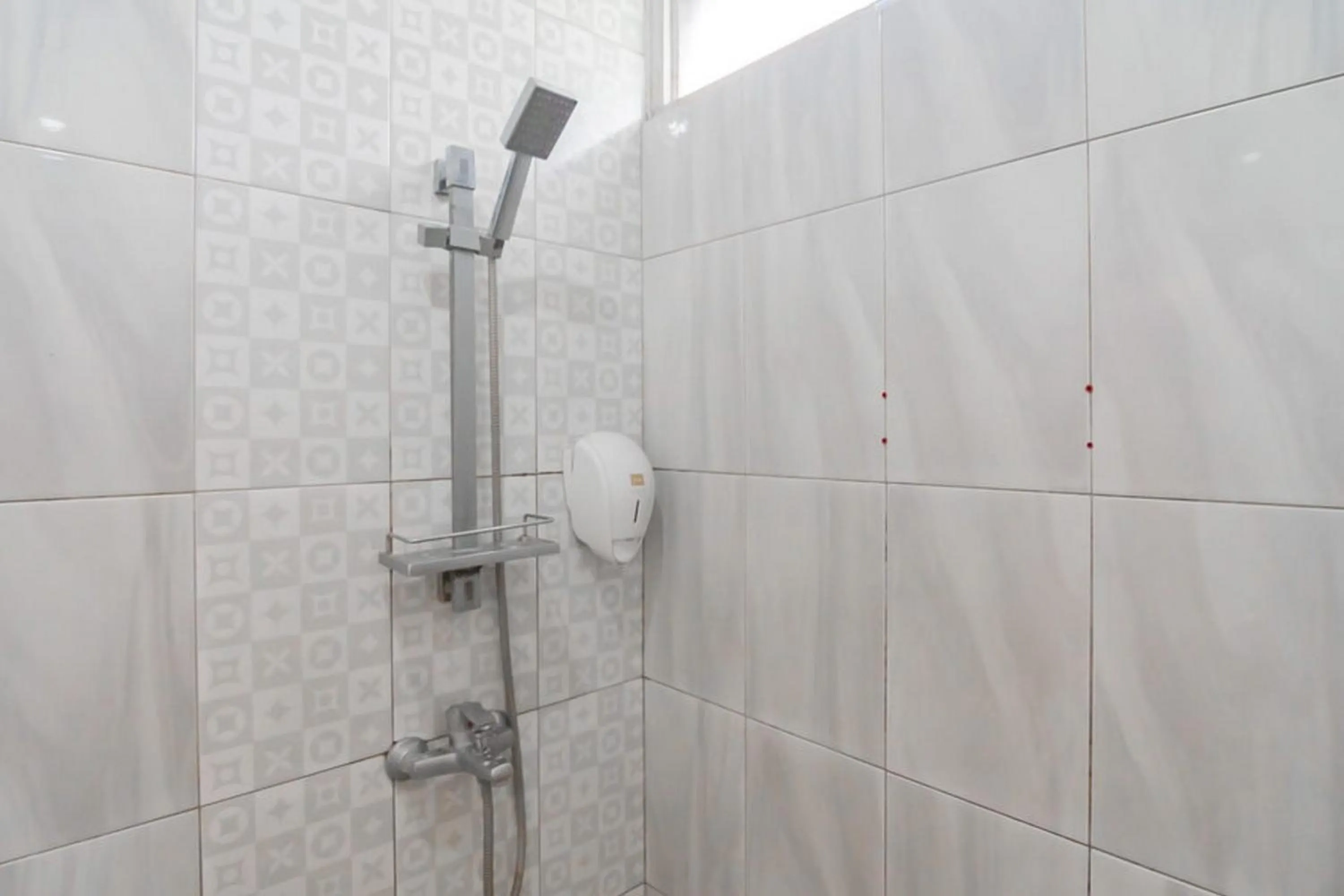 Bathroom in Sans Hotel Cihampelas Bandung