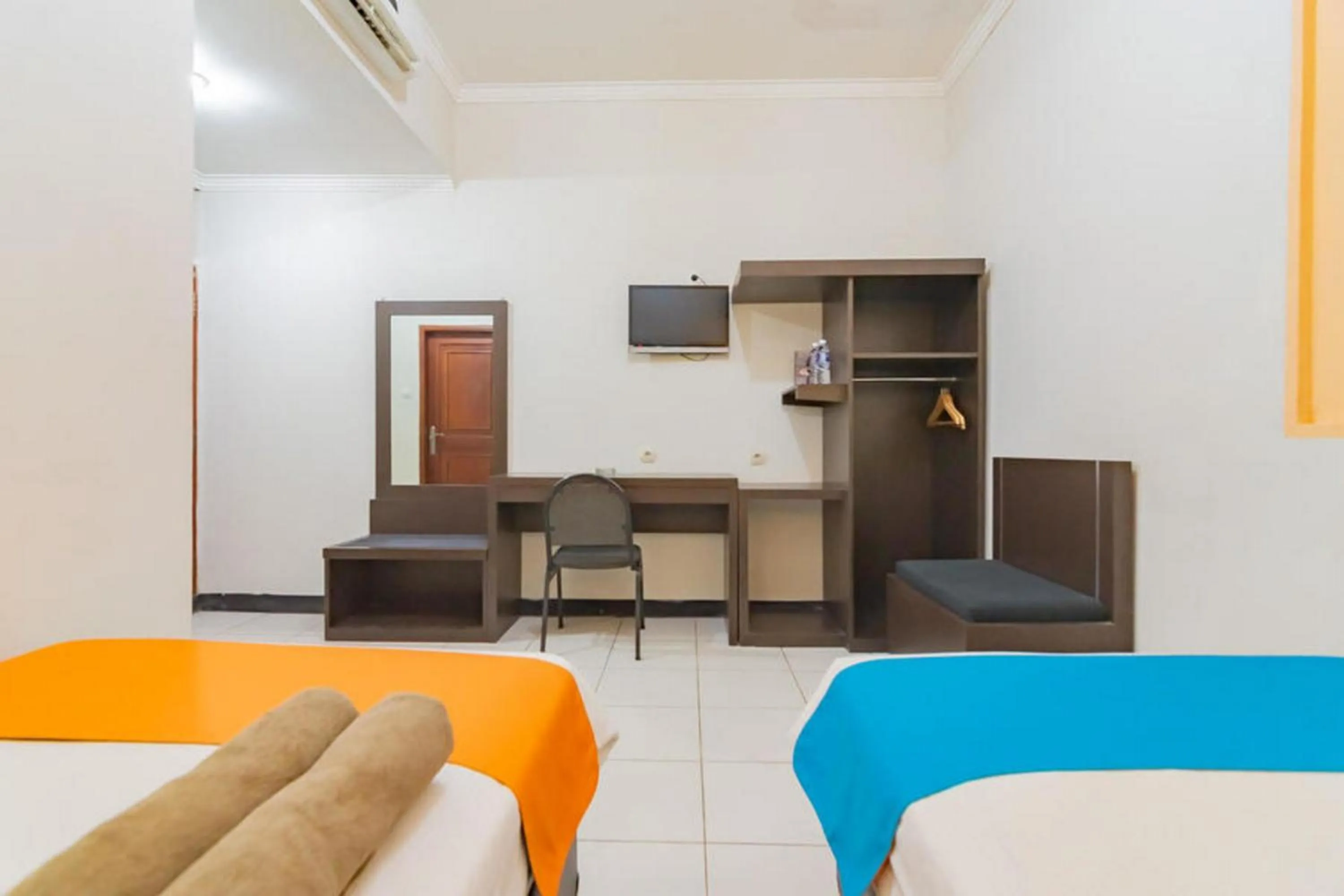 Bedroom in Sans Hotel Cihampelas Bandung