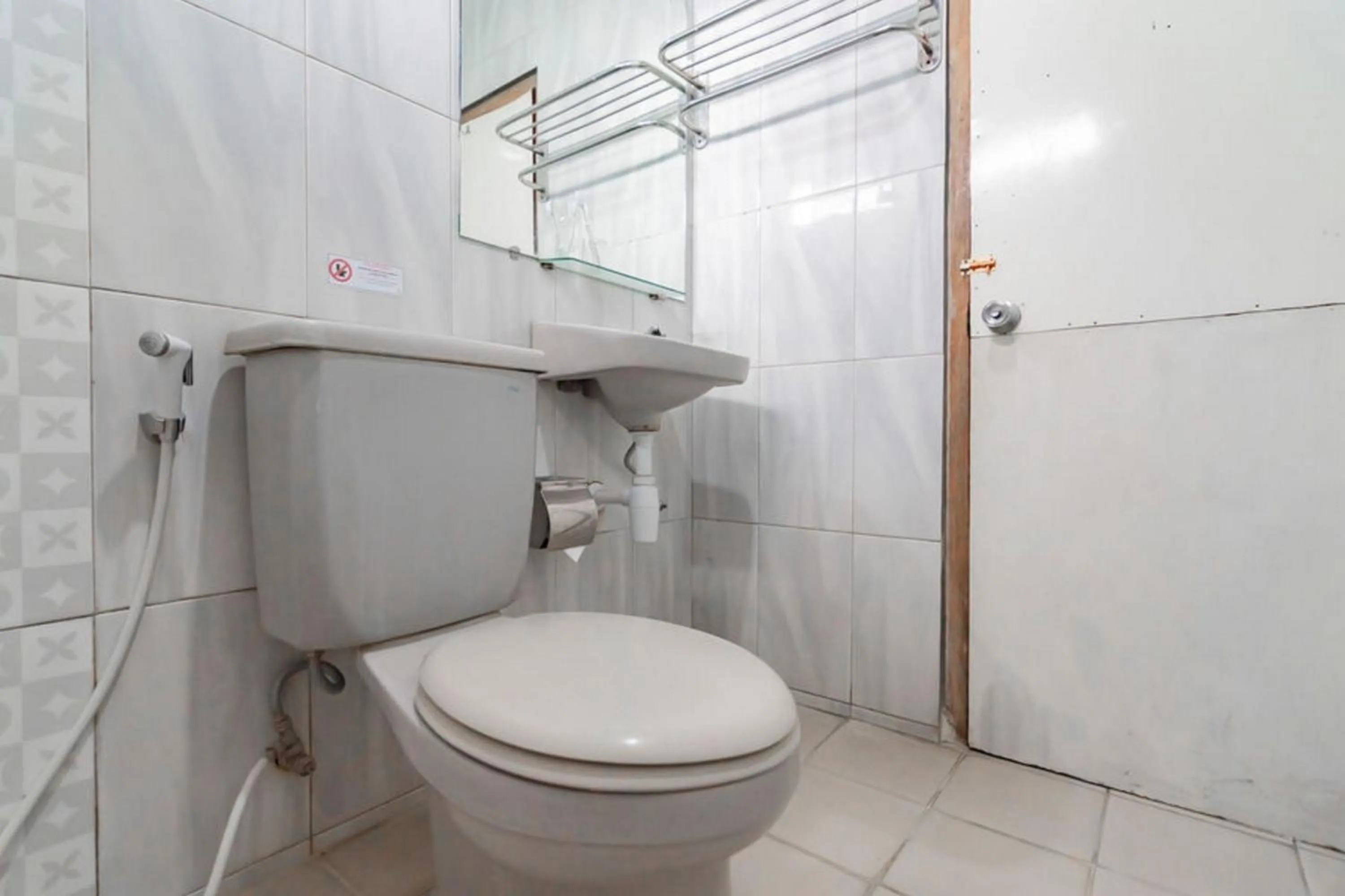 Bathroom in Sans Hotel Cihampelas Bandung