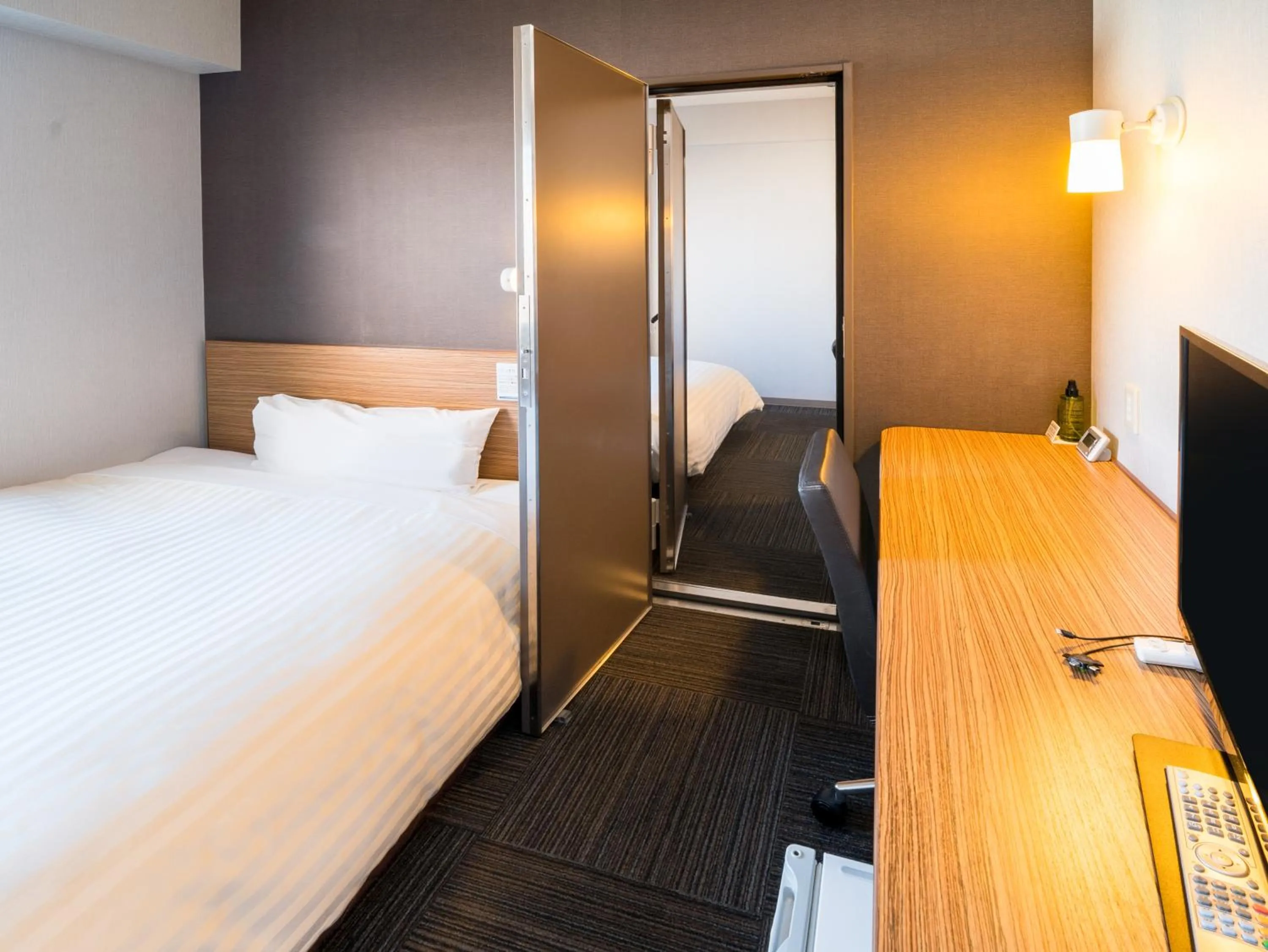 Photo of the whole room, Bed in Super Hotel Saitama Omiya West