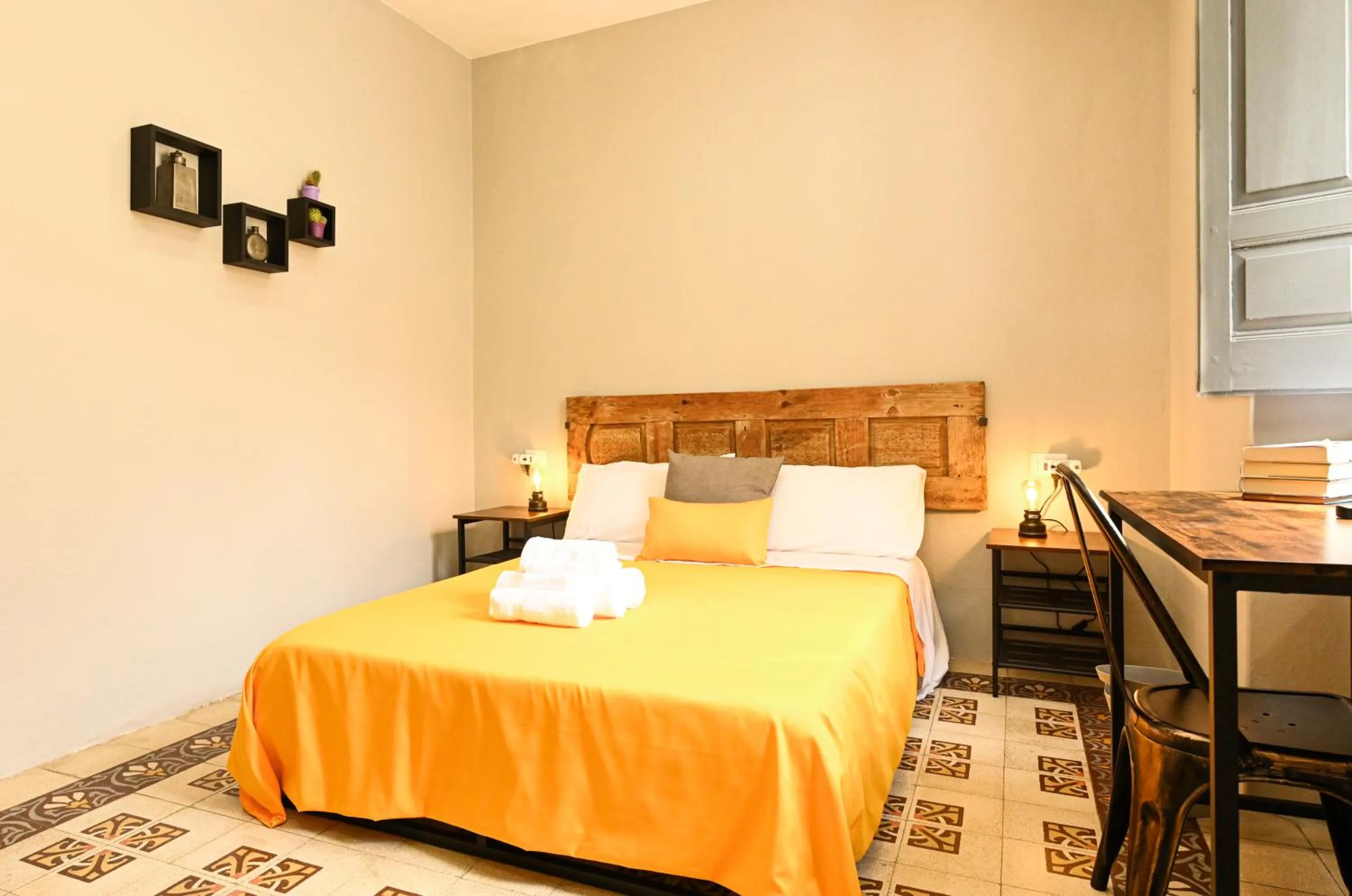 Bed in Urban Blue Guest House