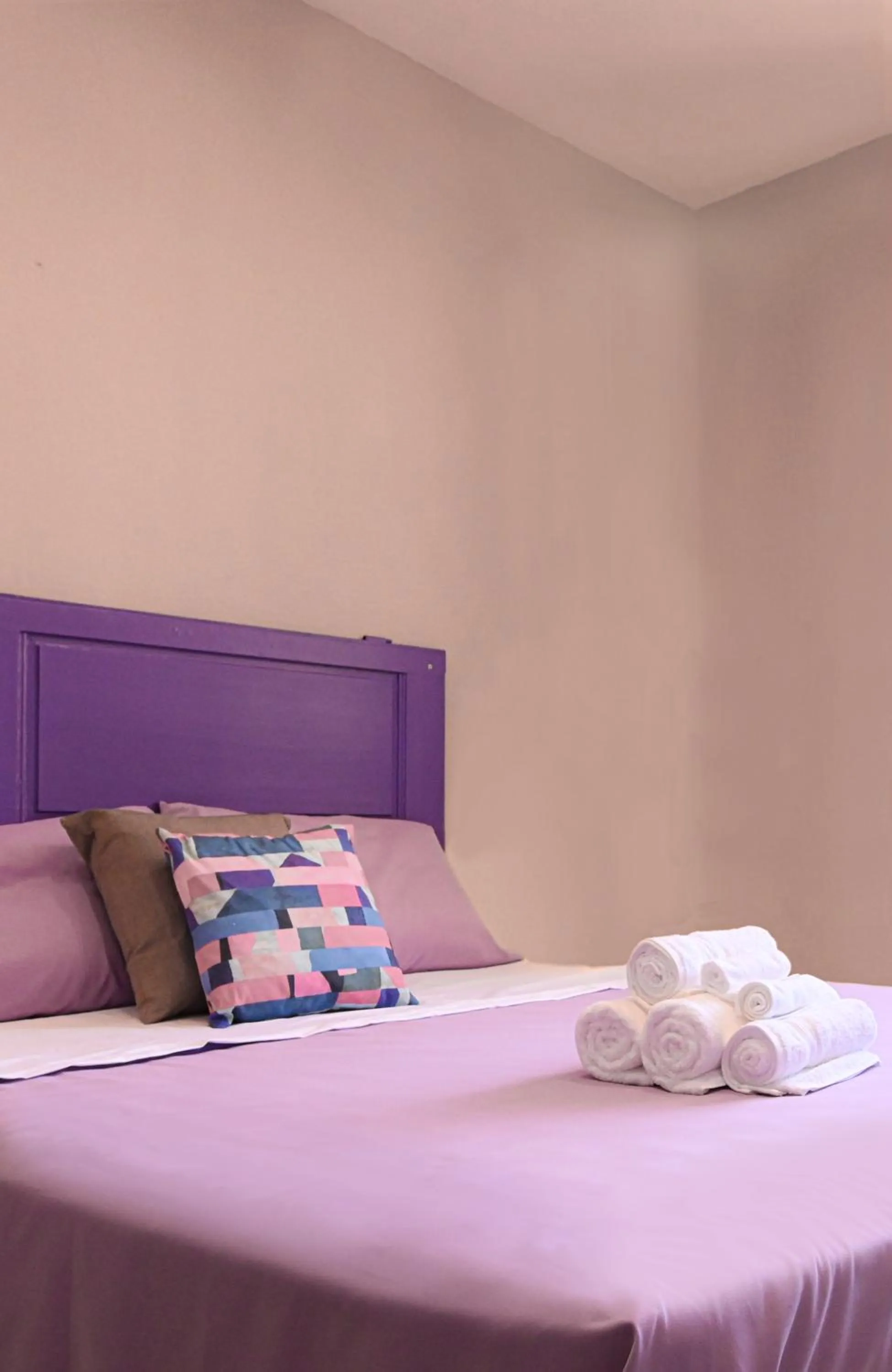 Bed in Urban Blue Guest House