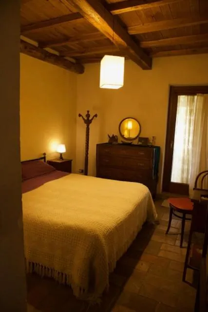 Bed in Il Casale di Aquarubra