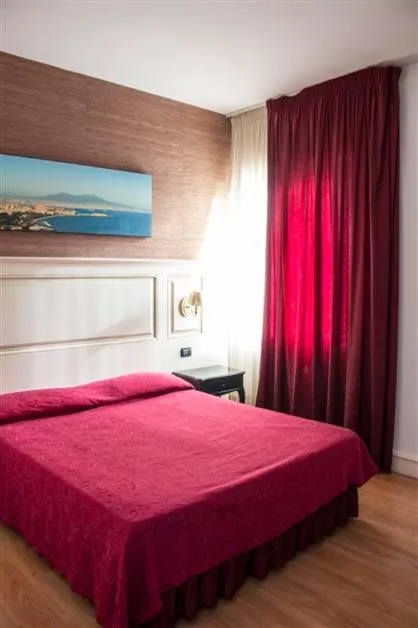 Bed in Hotel Mediterraneo