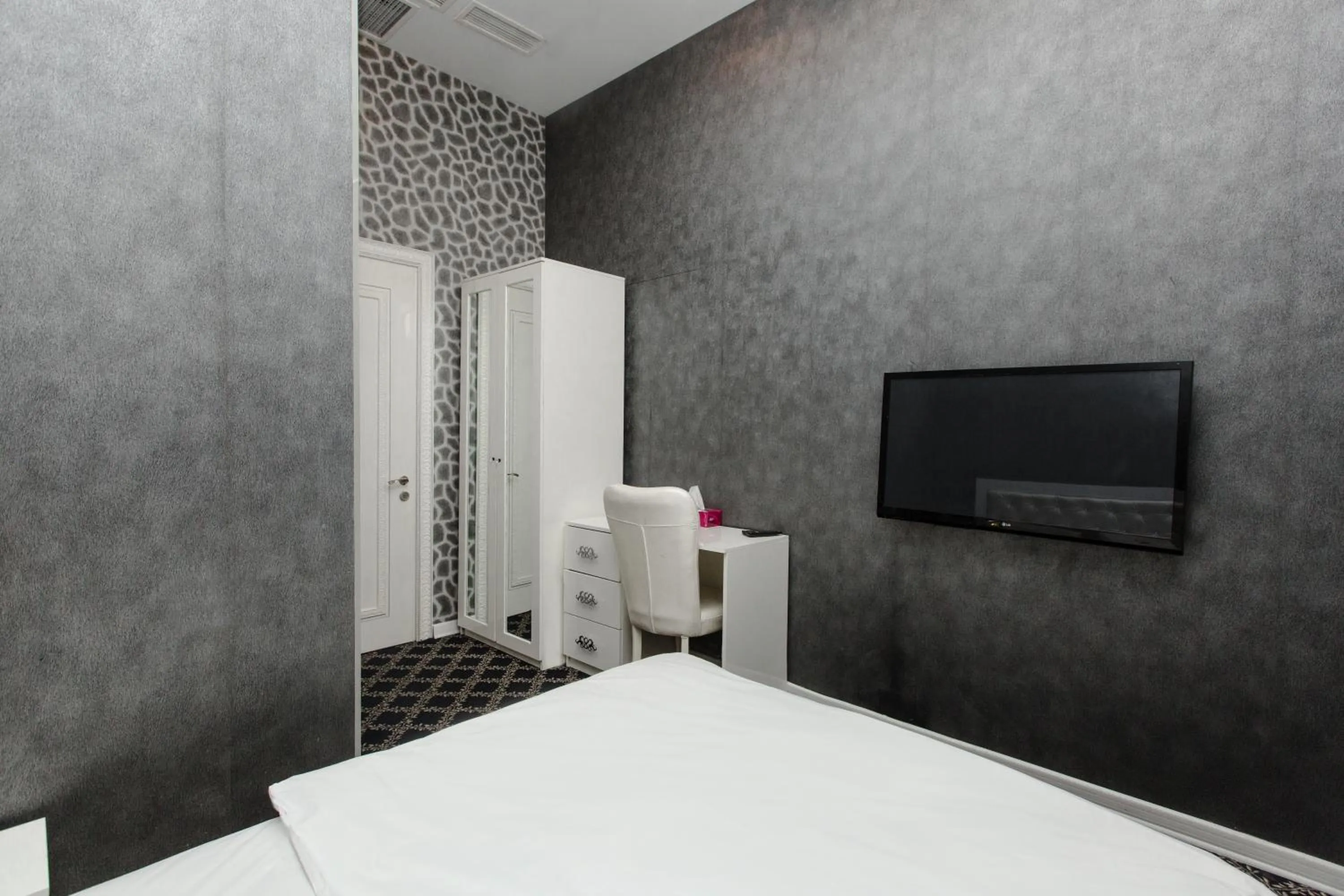 Bed in Admiral Hotel