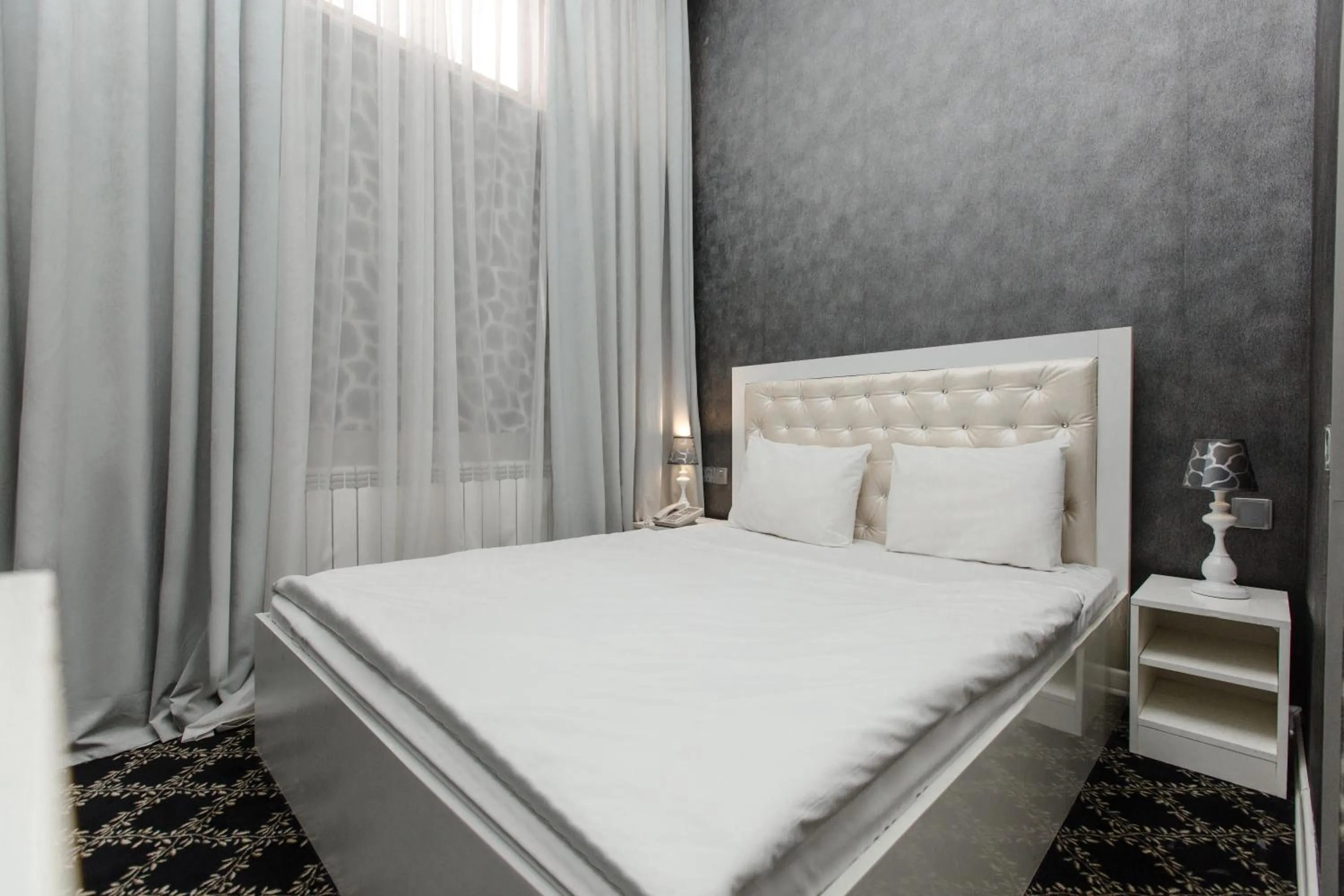 Bed in Admiral Hotel