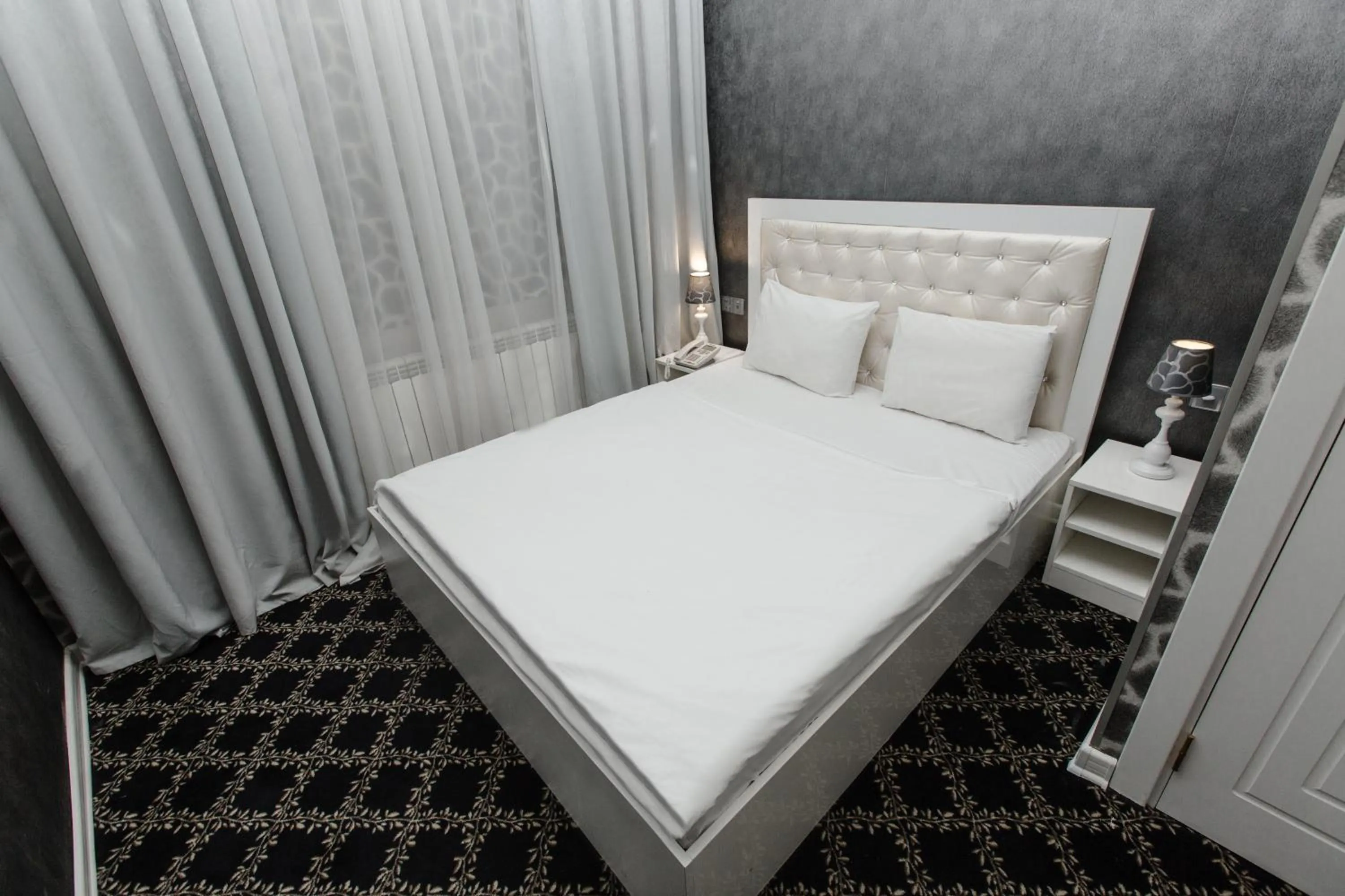 Bed in Admiral Hotel