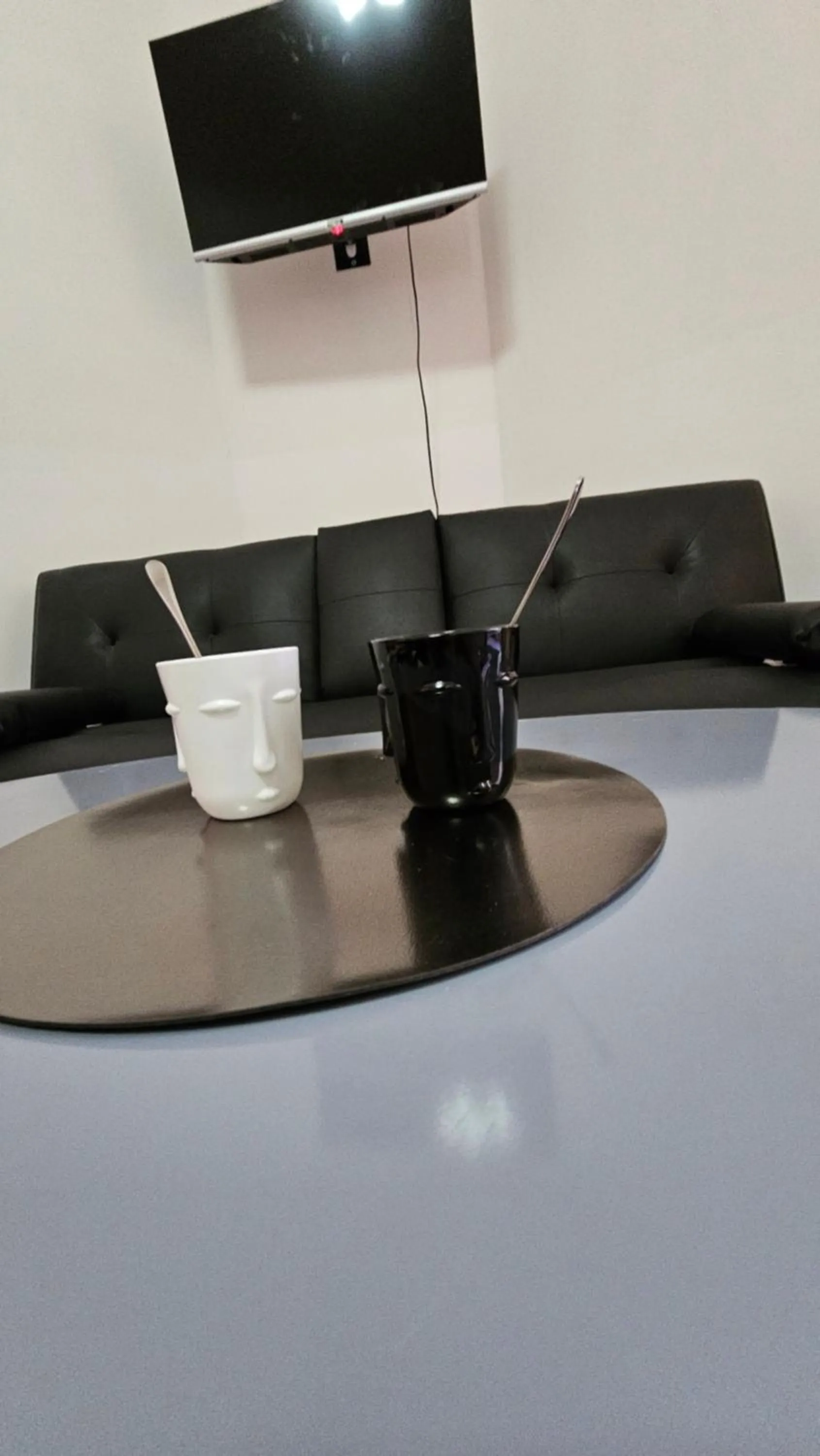 Communal lounge/ TV room in B&B Piazza Ragusa