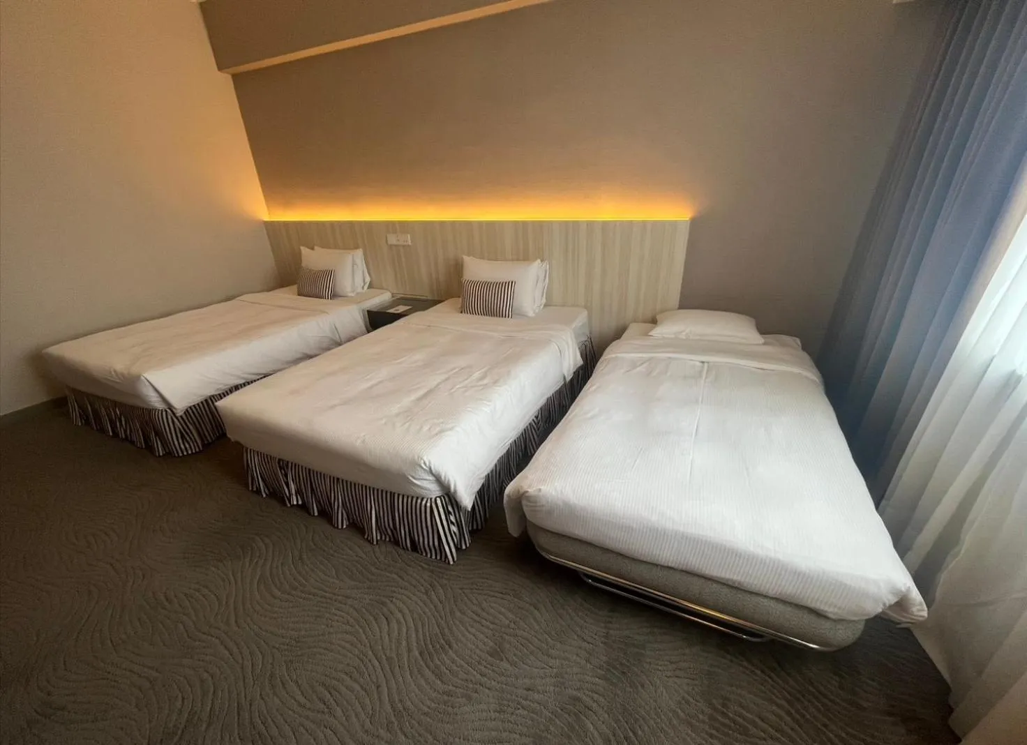 Bed in Caesar Park Hotel Taipei