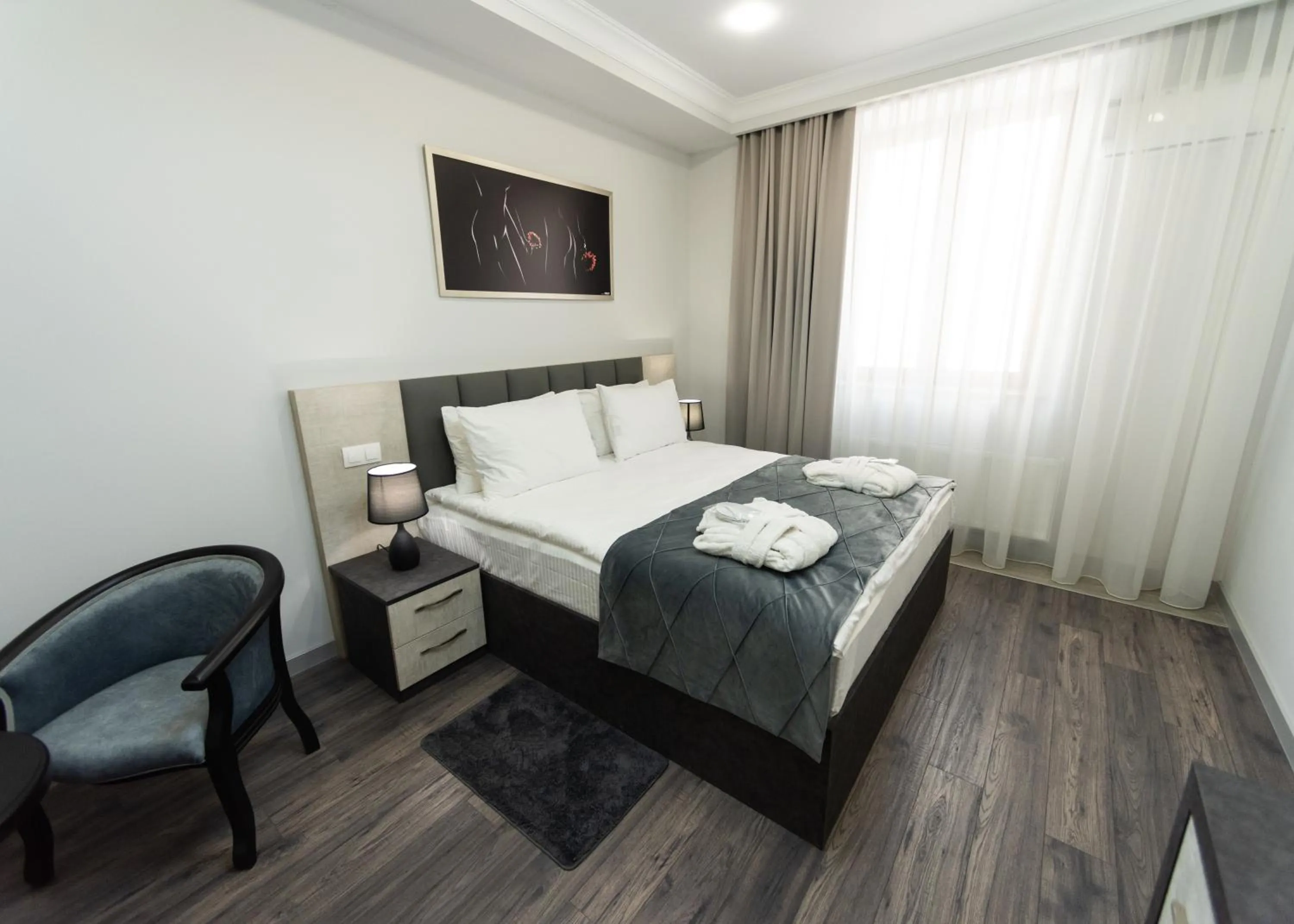 Photo of the whole room, Bed in Downtown Suites Yerevan