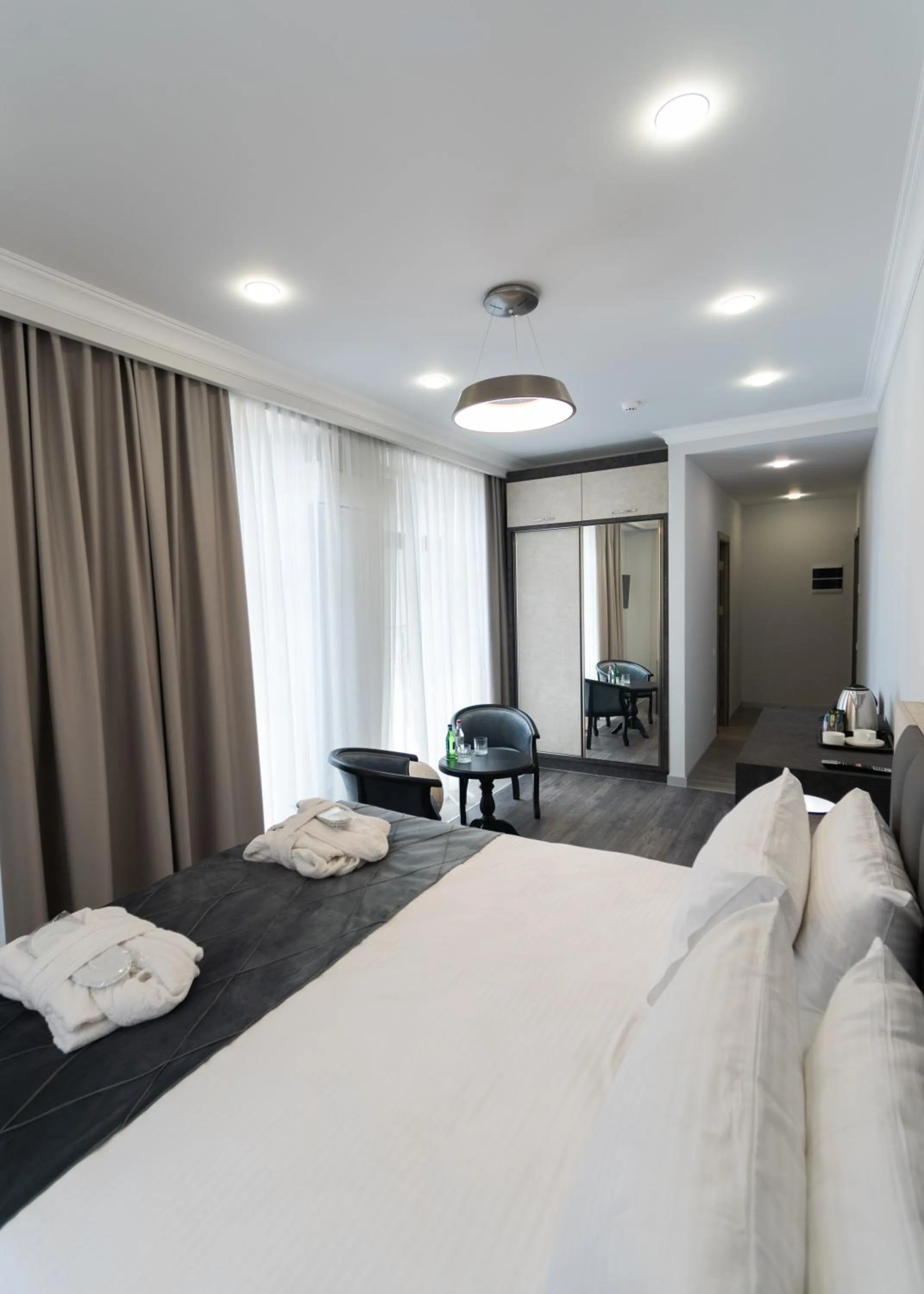 Photo of the whole room, Bed in Downtown Suites Yerevan