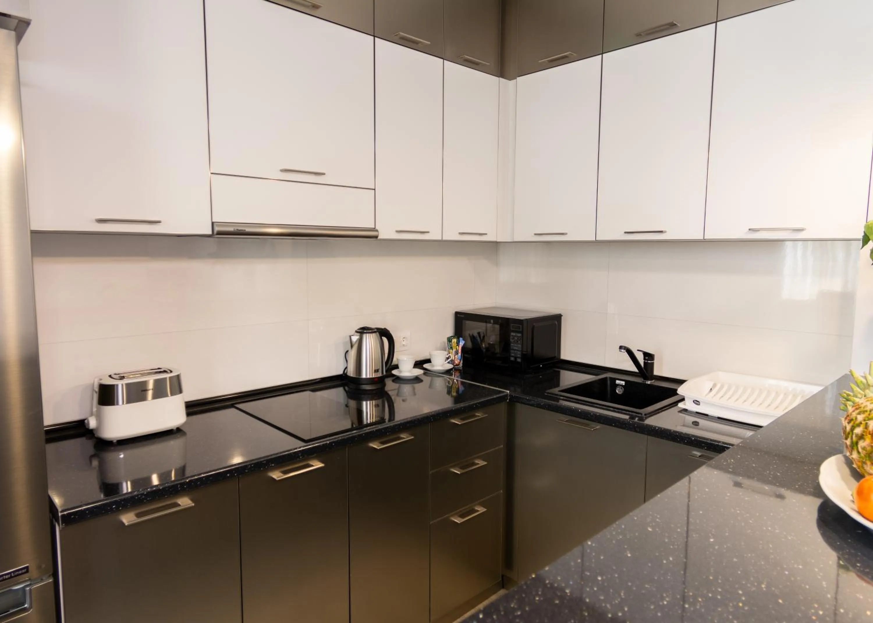 Kitchen or kitchenette in Downtown Suites Yerevan
