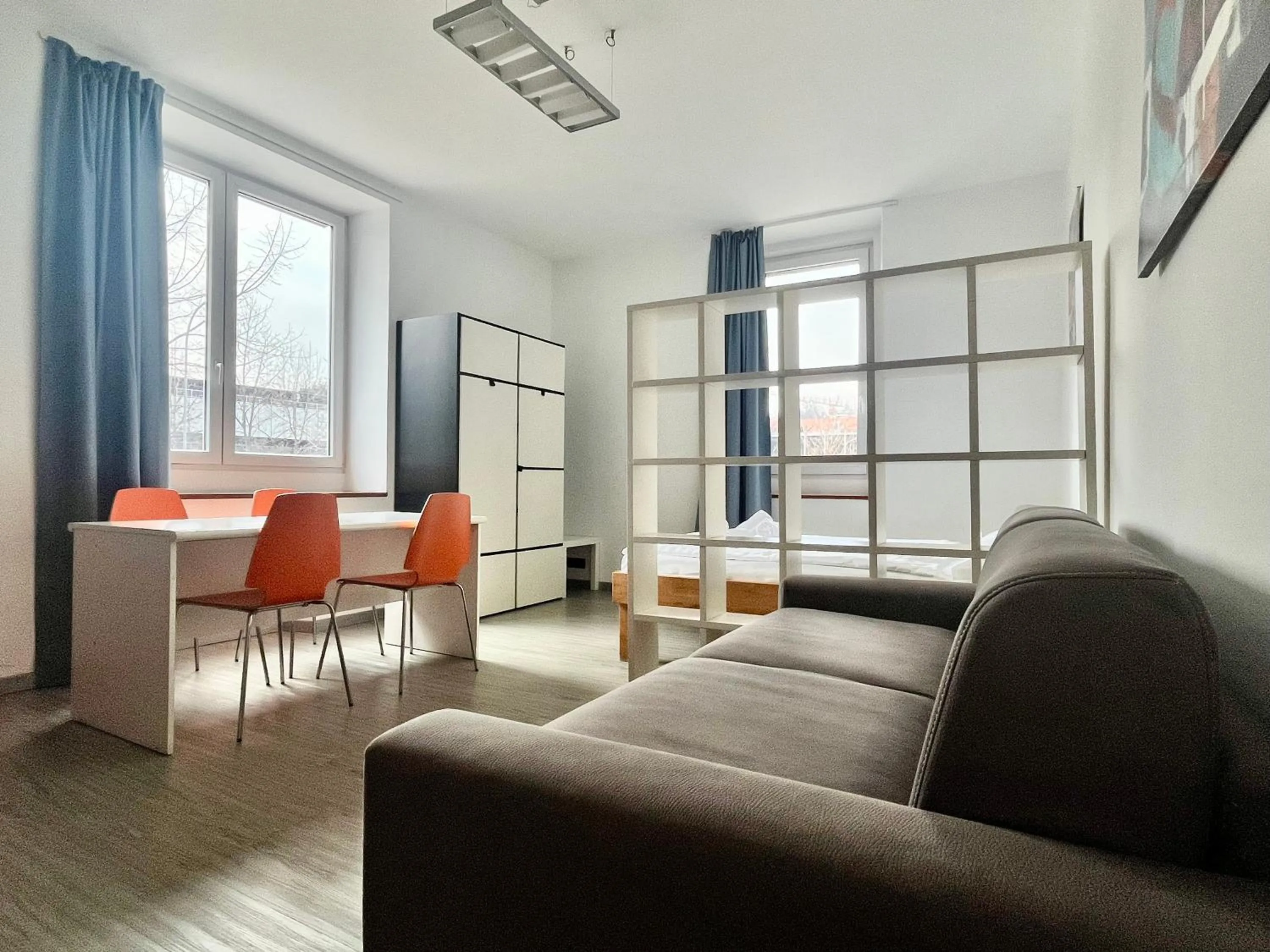 Living room in GuestHouse University by LR - self check in