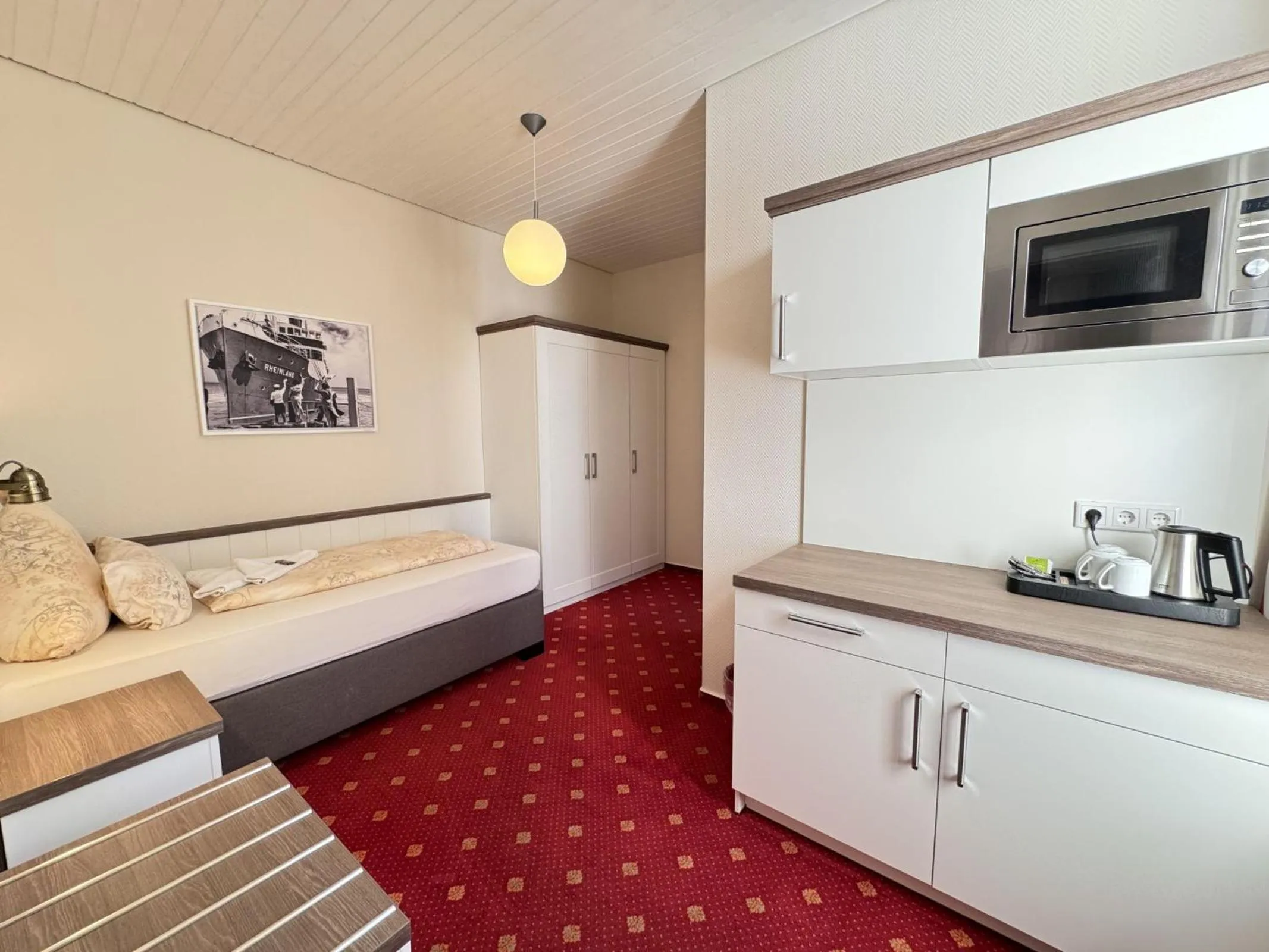 Photo of the whole room, Bed in Hotel Weisse Düne