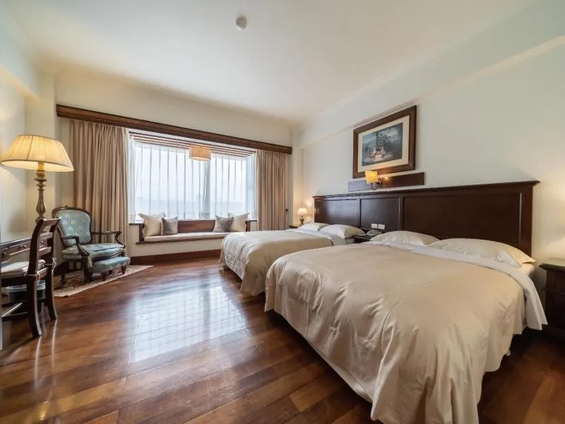 Bed in Shangrila Boutique Hotel