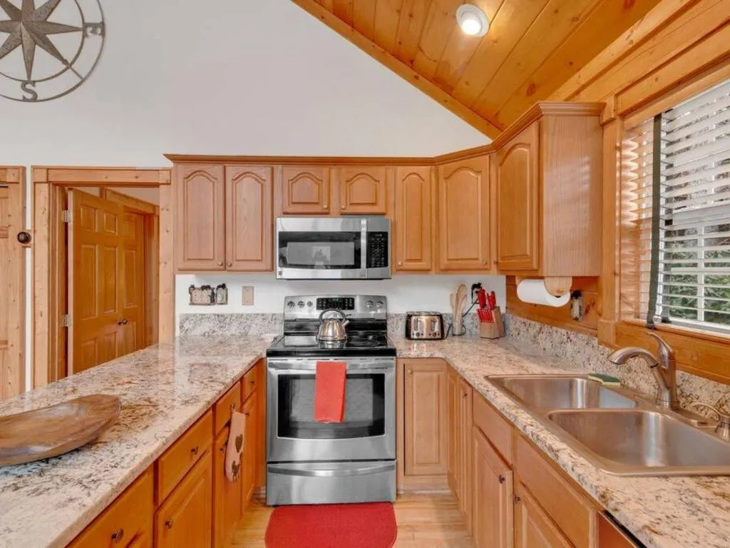 Kitchen or kitchenette in Soco Serene Cabin in the Heart of Maggie Valley
