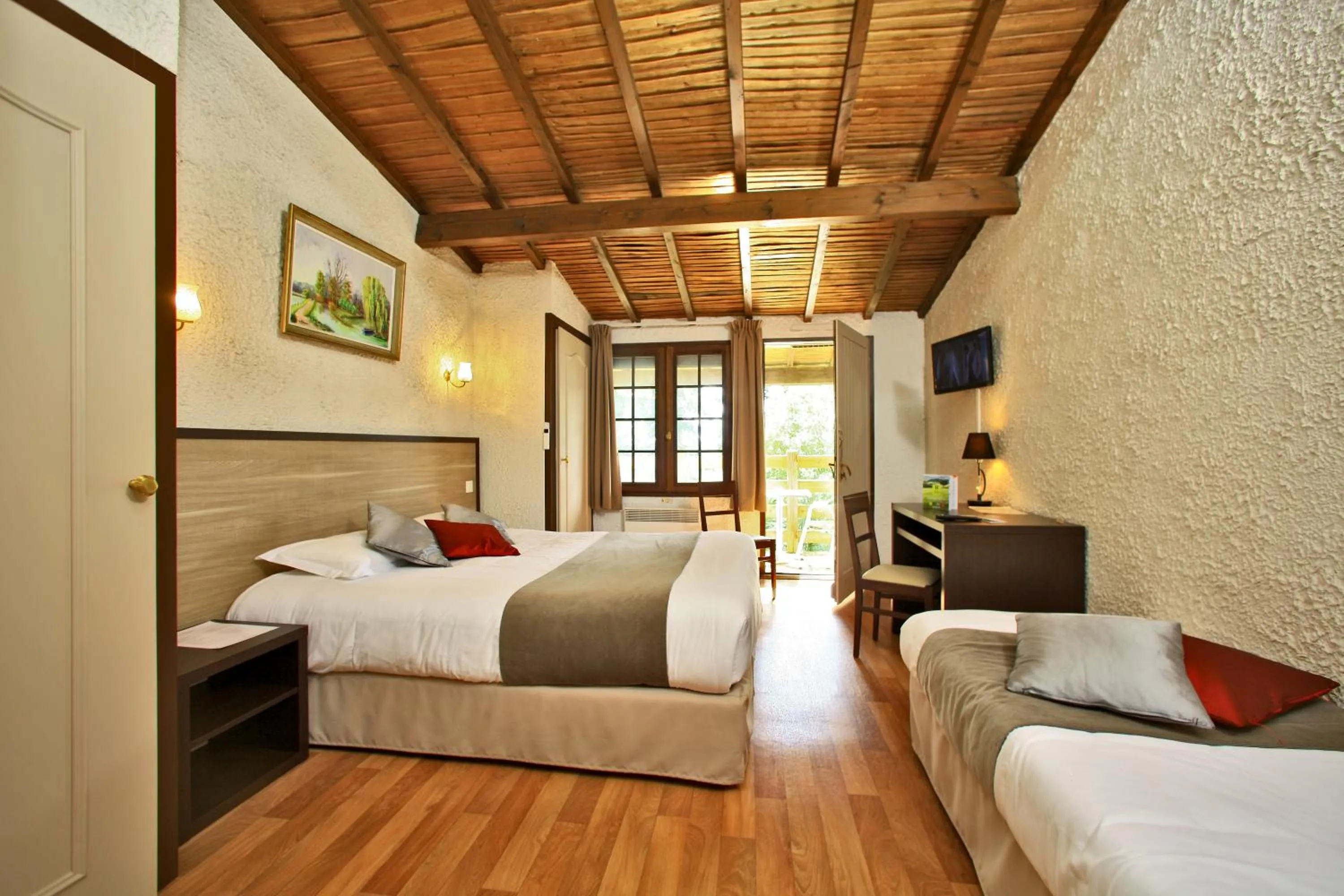 Photo of the whole room, Bed in Logis Hôtel La Chaumière