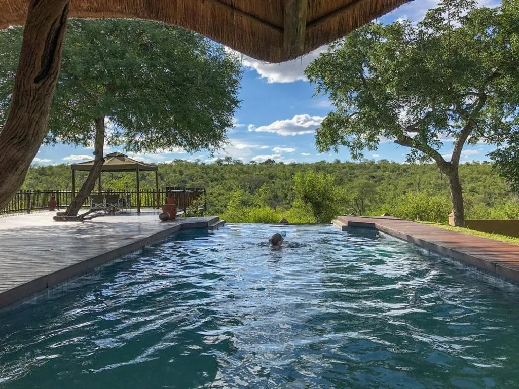 Pool view in Muweti Bush Lodge