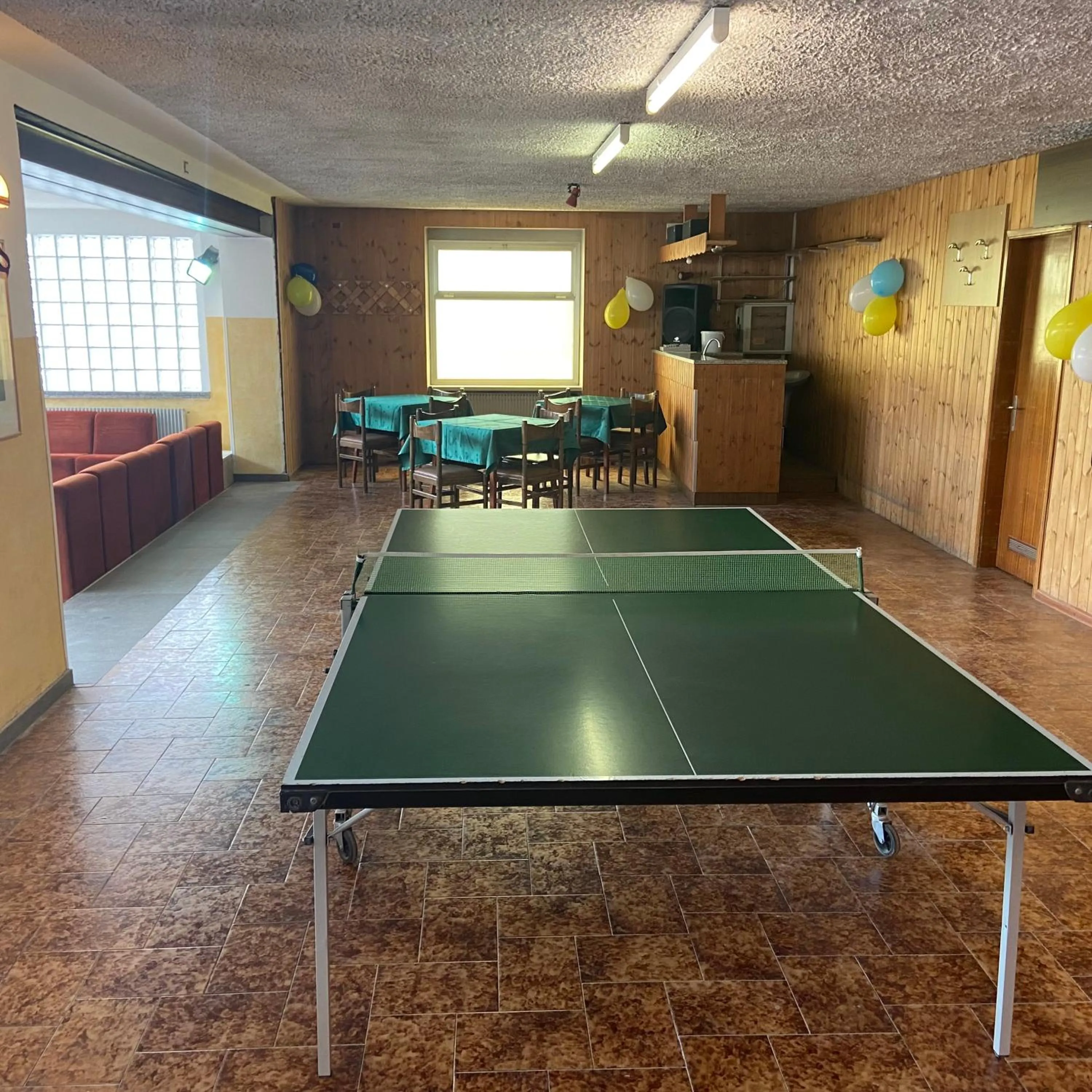 Communal lounge/ TV room in Hotel Olisamir