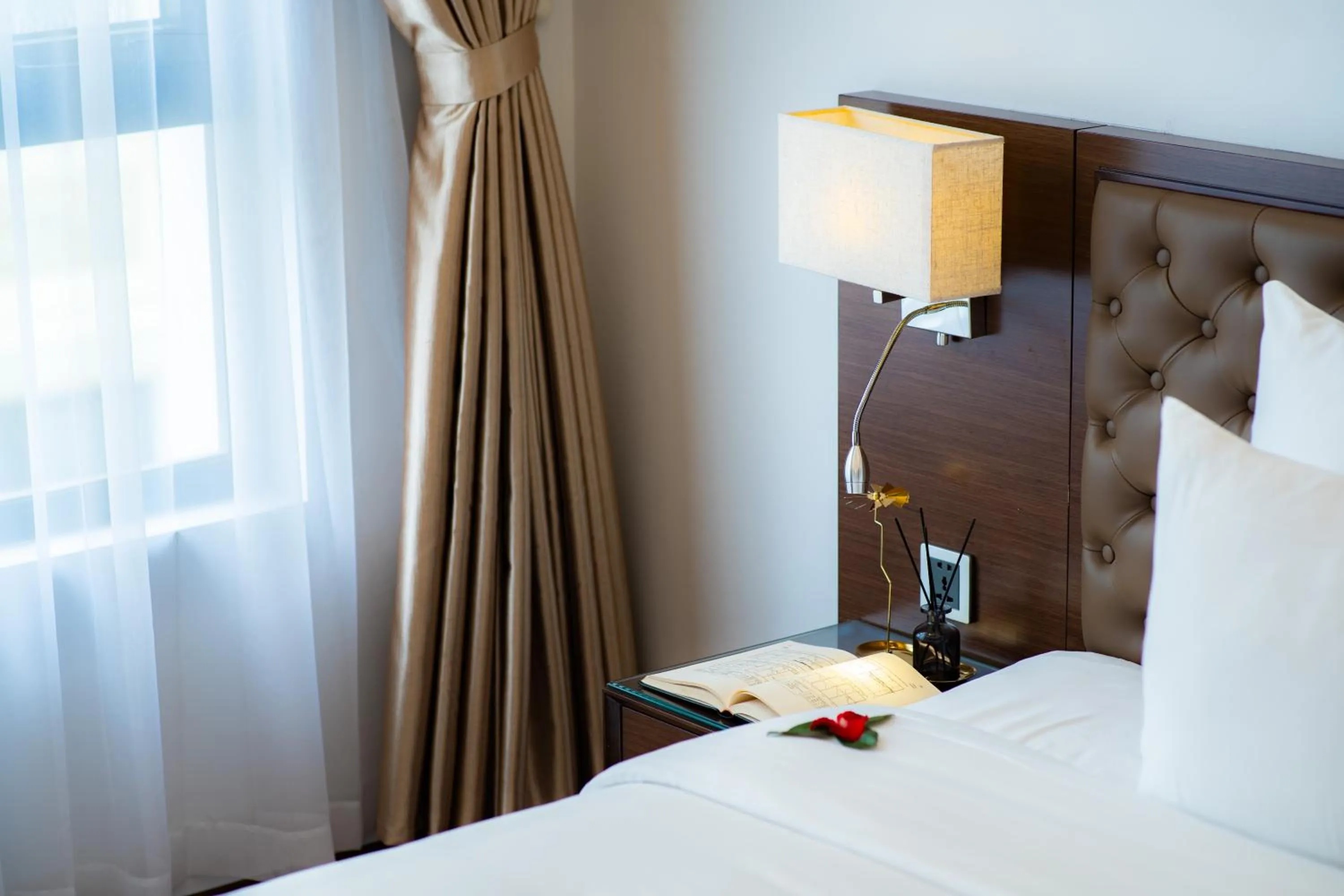 Bed in Hạ Long New Century Hotel