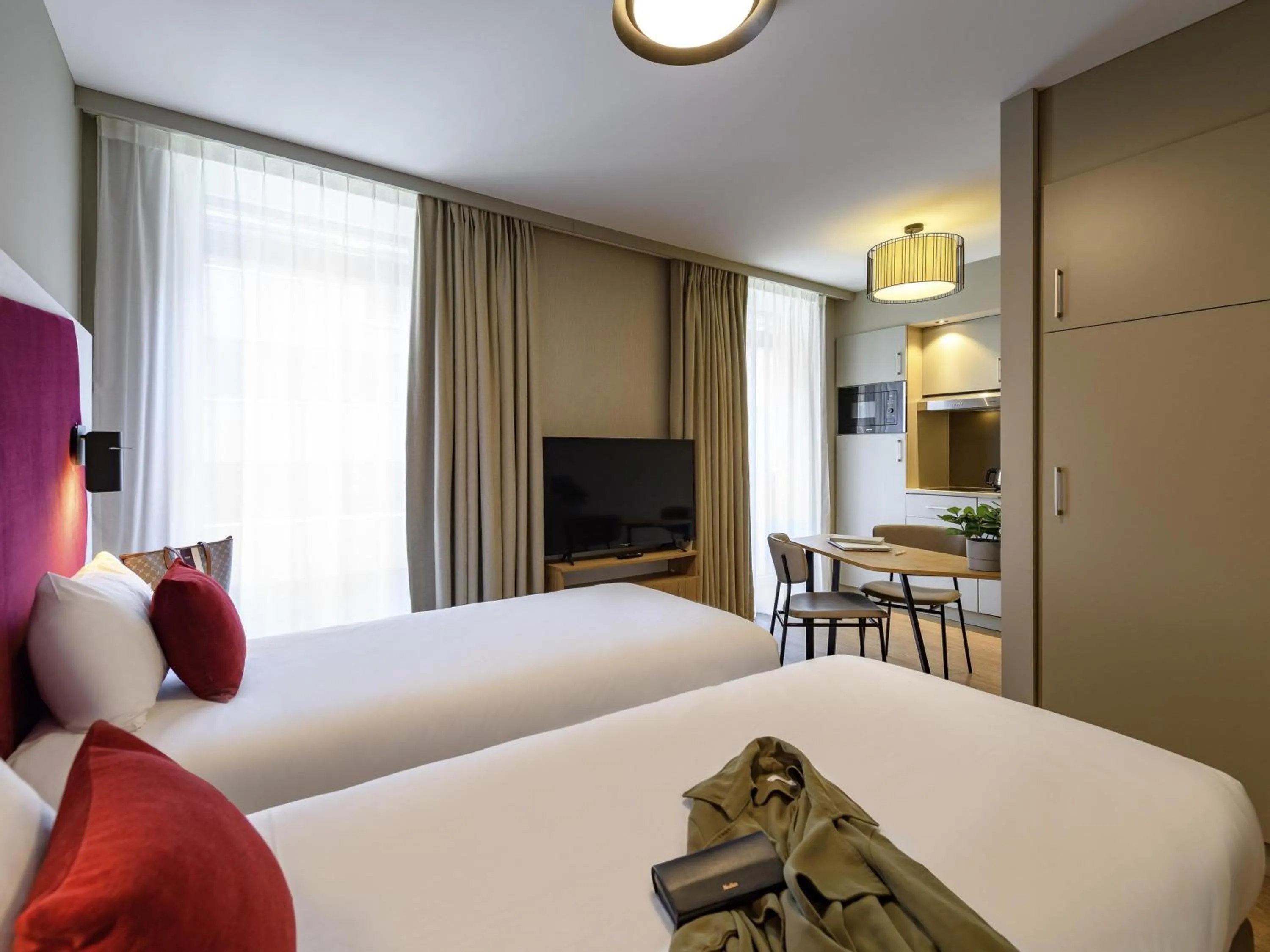 Bedroom, Bed in Aparthotel Adagio Zurich City Center