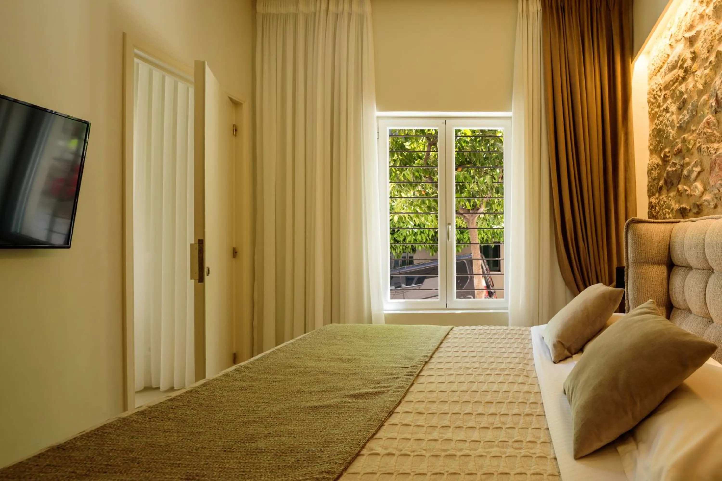 Bed in THIRAMENOUS RESIDENCE