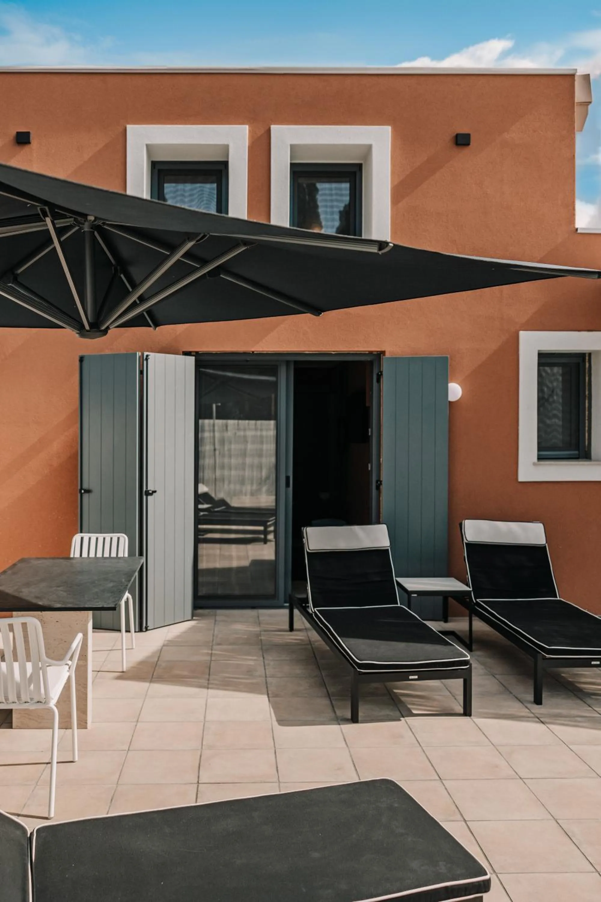 sunbed in Tessera Villas & Studios Collection