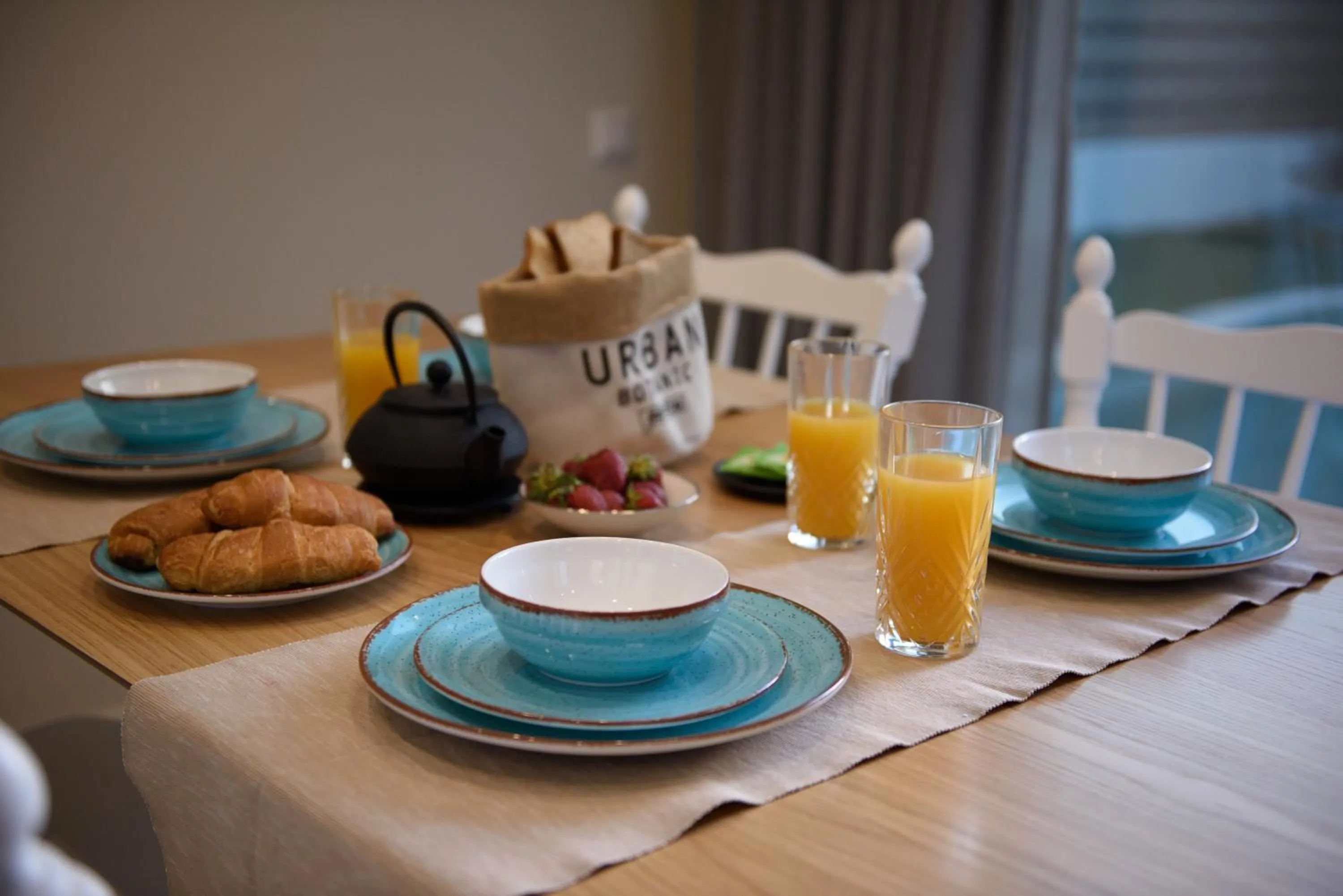Dining area in Tessera Villas & Studios Collection