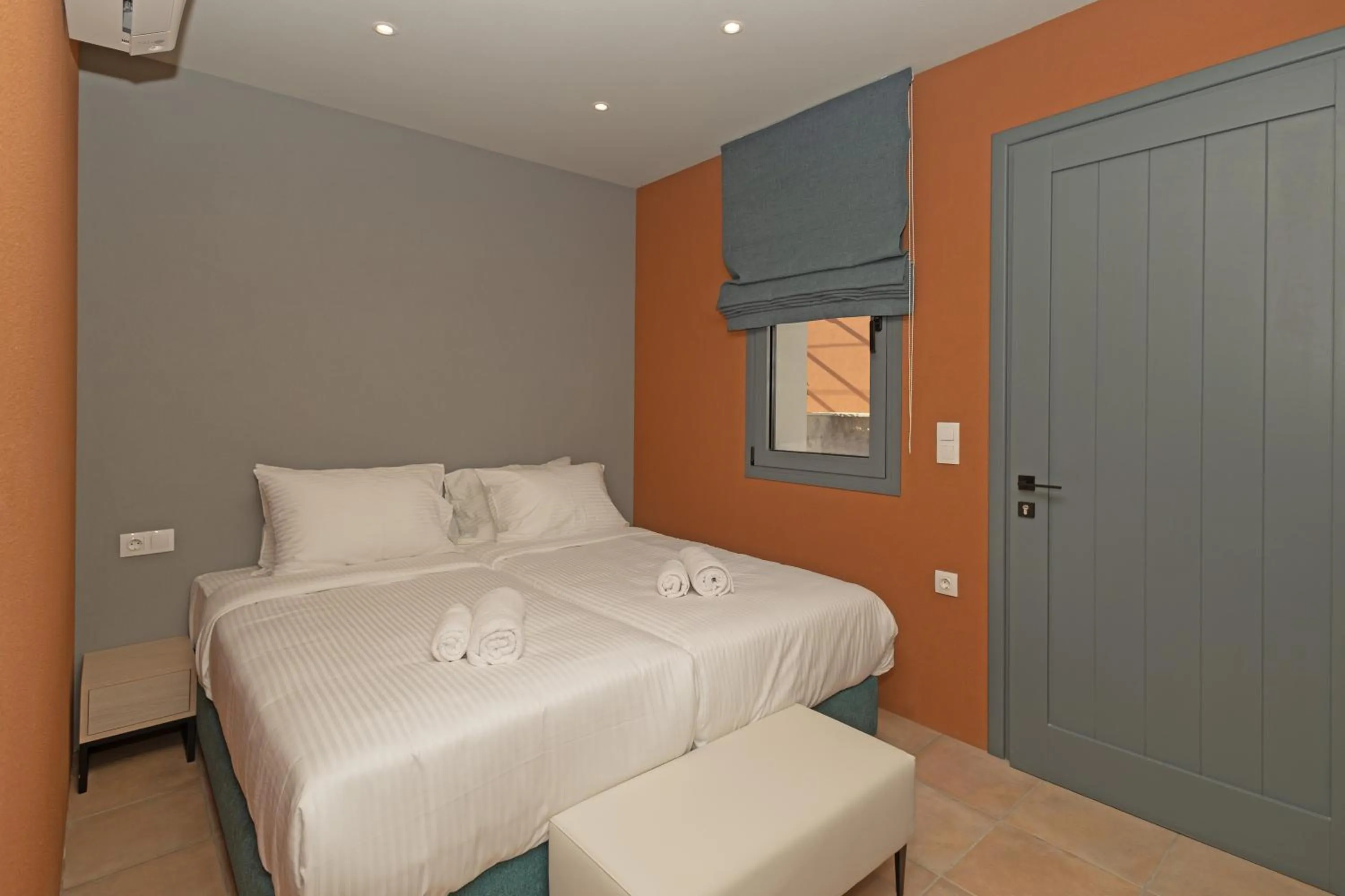 Bed in Tessera Villas & Studios Collection