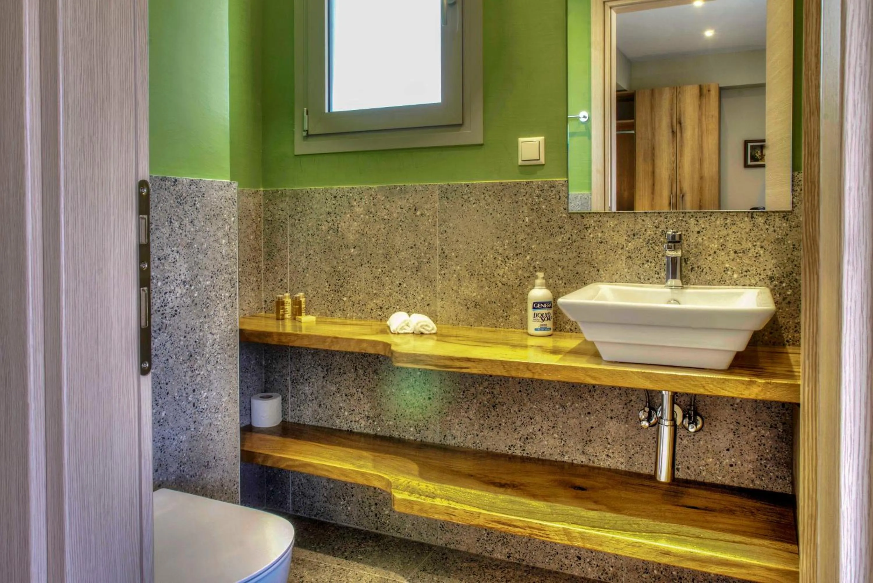 Bathroom in Tessera Villas & Studios Collection